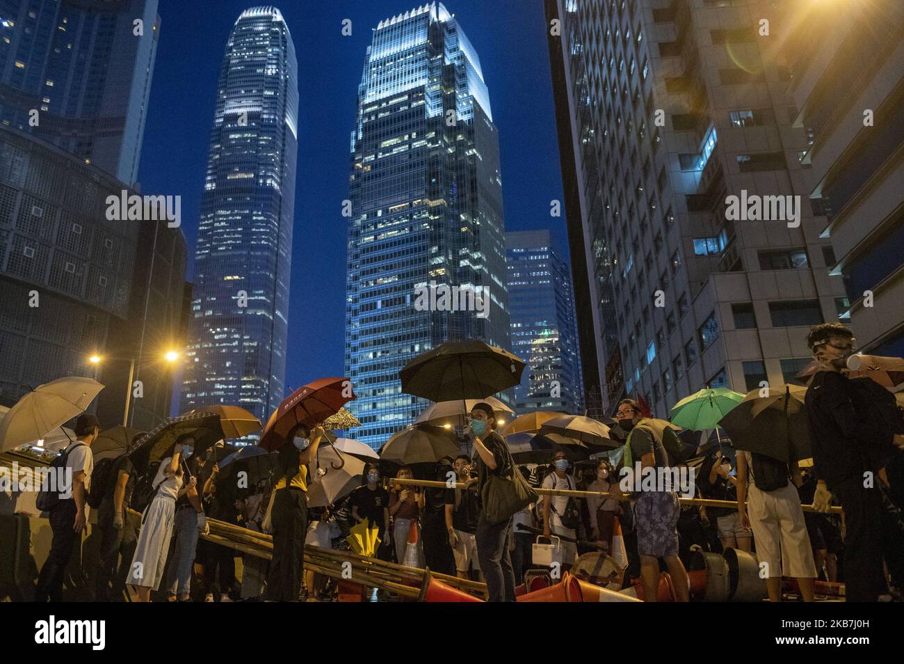 Protesters are seen setting a roadblock in Hong Kong on October 4, 2019, Hong Kong invoked emergency powers for the first time in more than half a century to ban face masks for protesters after months of unrest, prompting demonstrators to occupy downtown streets and forcing the metro operator to shut down all services late Friday. (Photo by Vernon Yuen/NurPhoto) Stock Photo