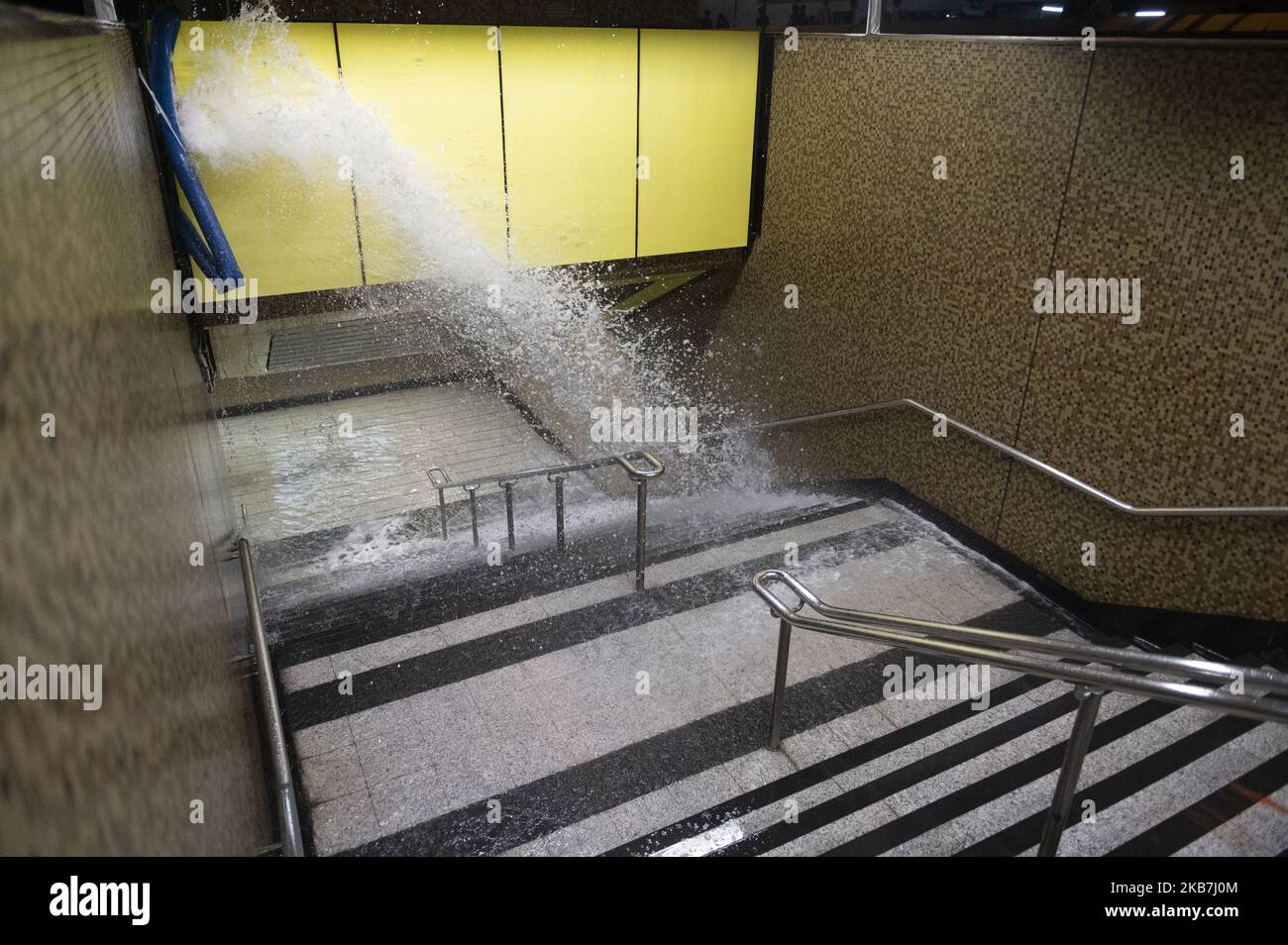Water are seen during into an MTR station in Hong Kong on October 4, 2019, Hong Kong invoked emergency powers for the first time in more than half a century to ban face masks for protesters after months of unrest, prompting demonstrators to occupy downtown streets and forcing the metro operator to shut down all services late Friday. (Photo by Vernon Yuen/NurPhoto) Stock Photo