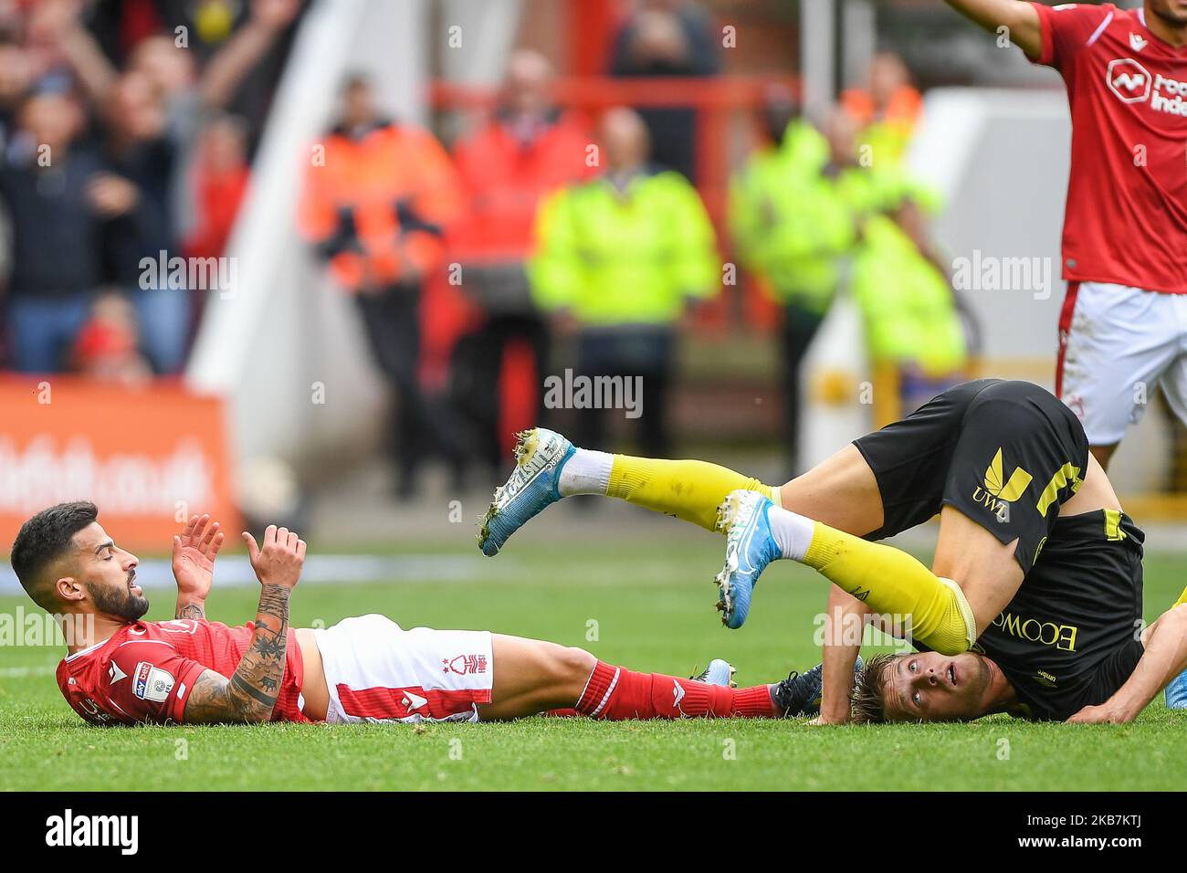 Tiago Silva (28) of Nottingham Forest and Mathias Jensen (8) of Brentford during the Sky Bet Championship match between Nottingham Forest and Brentford at the City Ground, Nottingham on Saturday 5th October 2019. (Photo by Jon Hobley/MI News/NurPhoto) Stock Photo