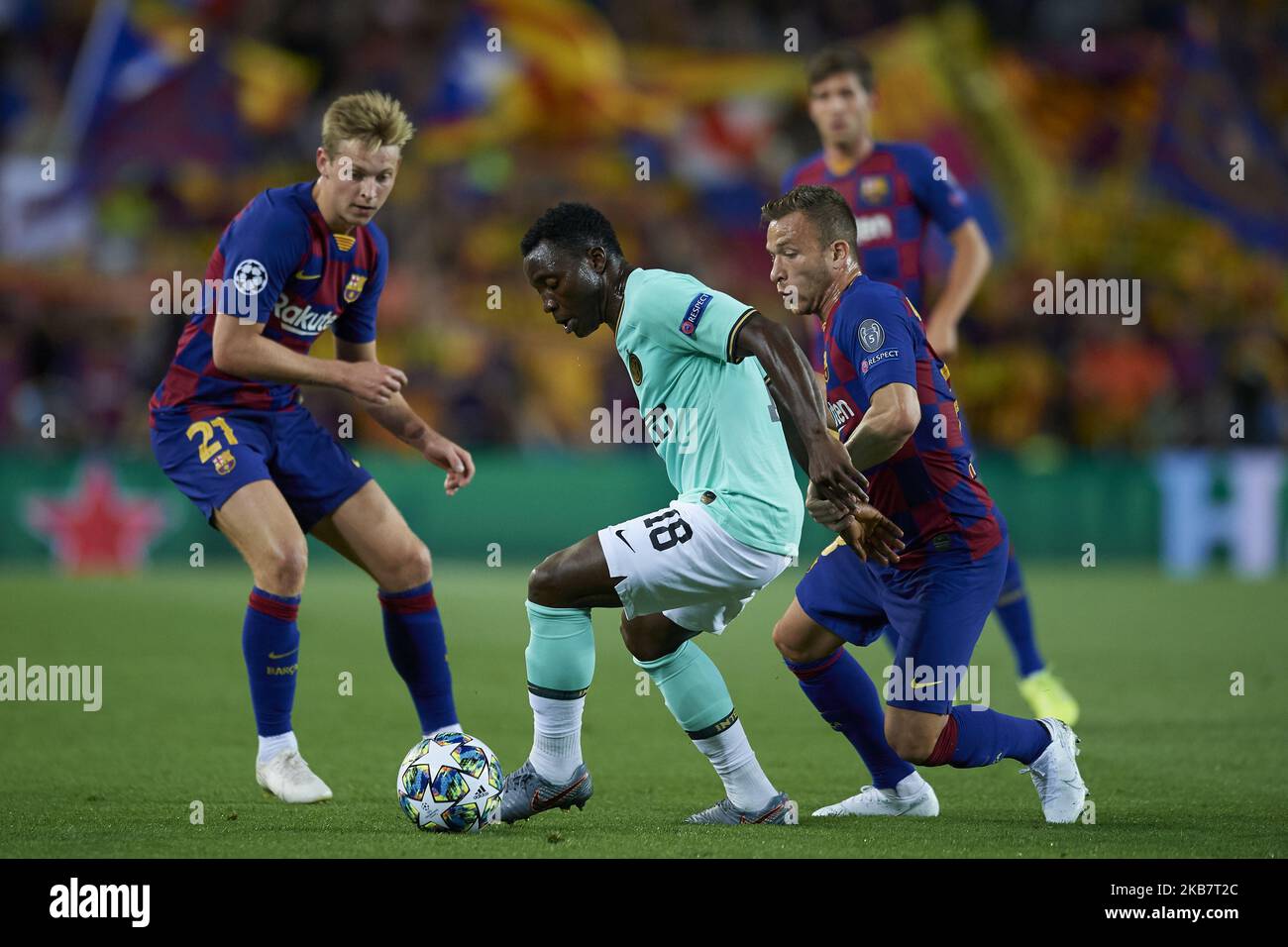 Kwadwo Asamoah of Inter of Milan and Arthur Melo of Barcelona compete for the ball during the UEFA Champions League group F match between FC Barcelona and Inter at Camp Nou on October 2, 2019 in Barcelona, Spain. (Photo by Jose Breton/Pics Action/NurPhoto) Stock Photo