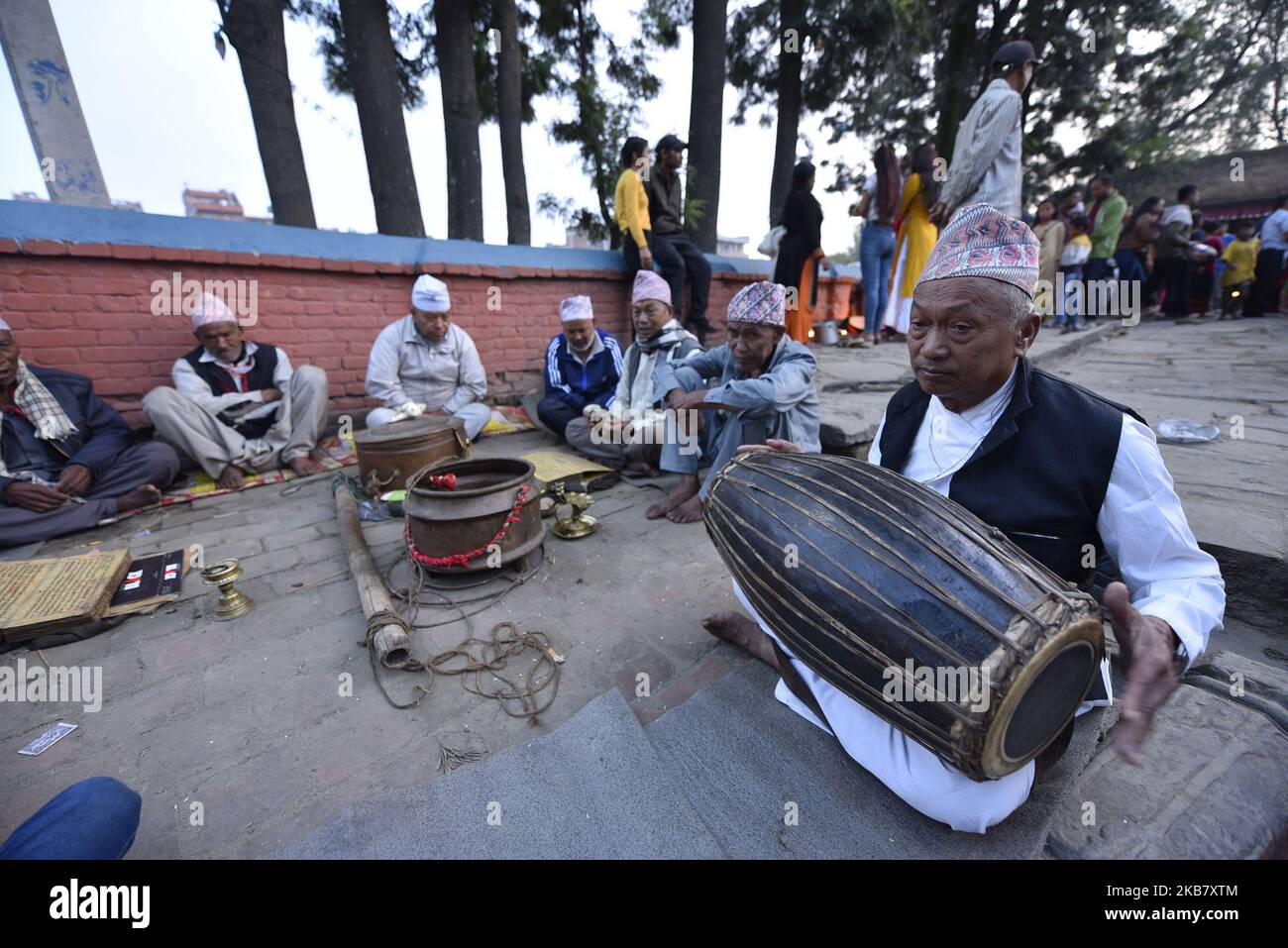 Nepalese devotees plays traditional instruments during the tenth day of
