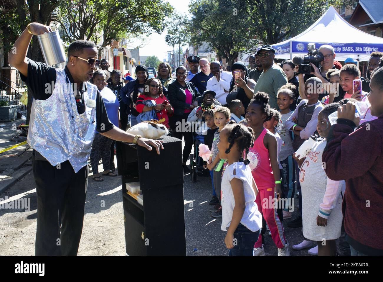 A magician performs for the community during a block party on Sunday October 5, 2019 at the site of the August Police shooting and hours long stand off that followed, in the Nicetown-Tioga section of Philadelphia, PA. (Photo by Bastiaan Slabbers/NurPhoto) Stock Photo