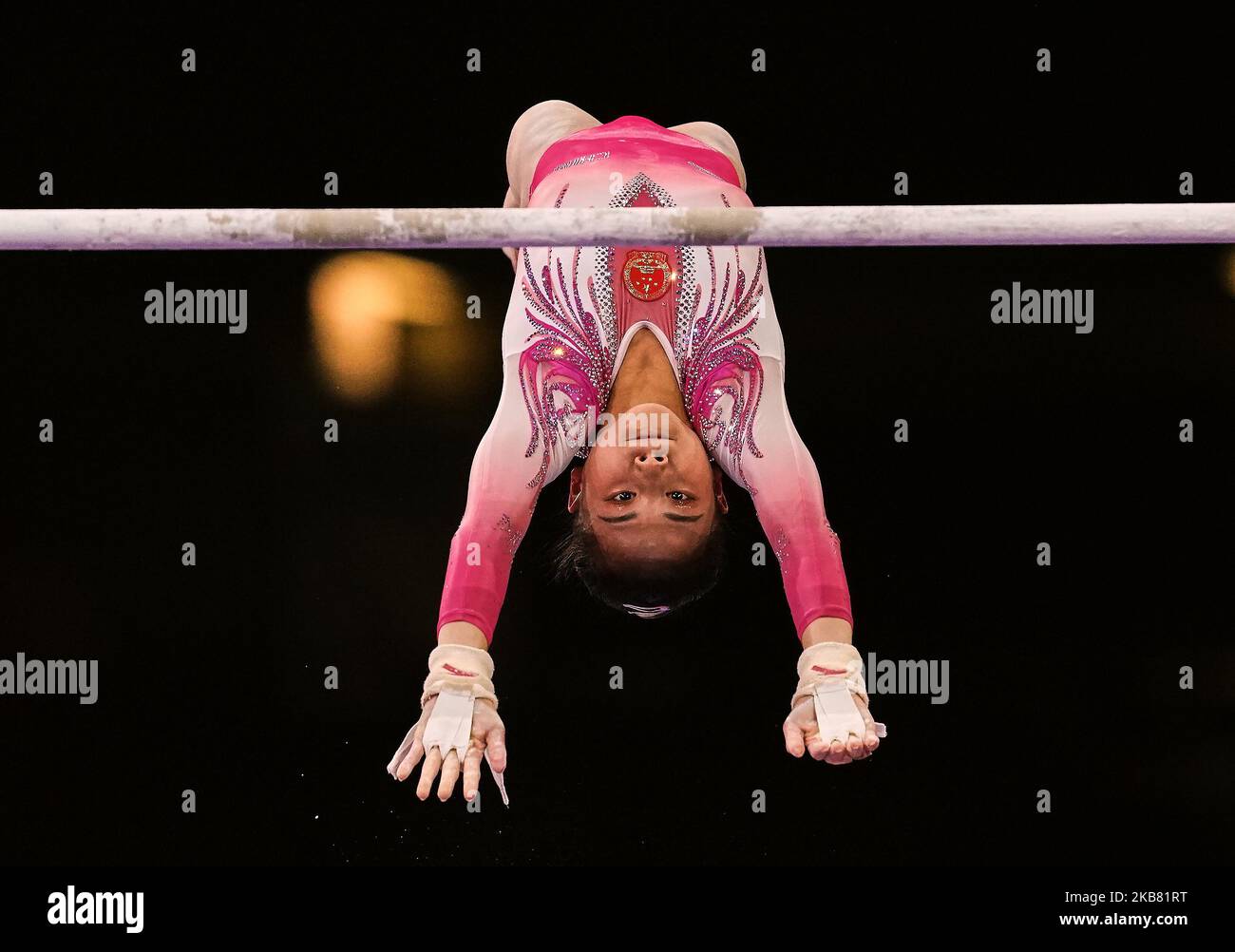 Shijia Li of China during uneven bars for women at the 49th FIG