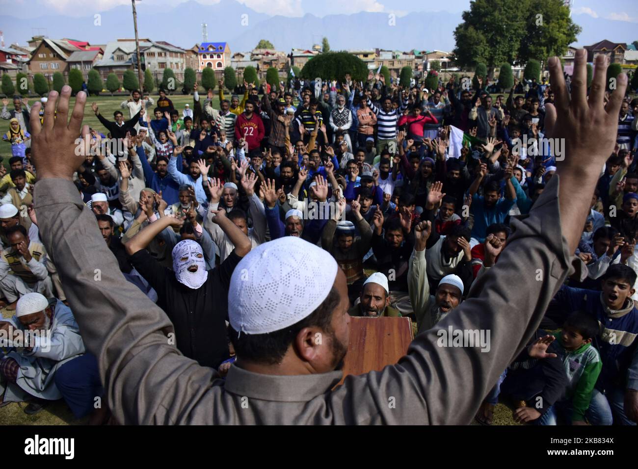 Kashmiri people protest after Friday prayers in Srinagar, Indian Administered Kashmir on 10 October 2019. Shutdown continues in Kashmir valley on 68th day after government of India Stripped statehood of Jammu and Kashmir. People were demanding the re-implementation of Article 370 which gave special status to the people of Jammu and Kashmir. (Photo by Muzamil Mattoo/NurPhoto) Stock Photo