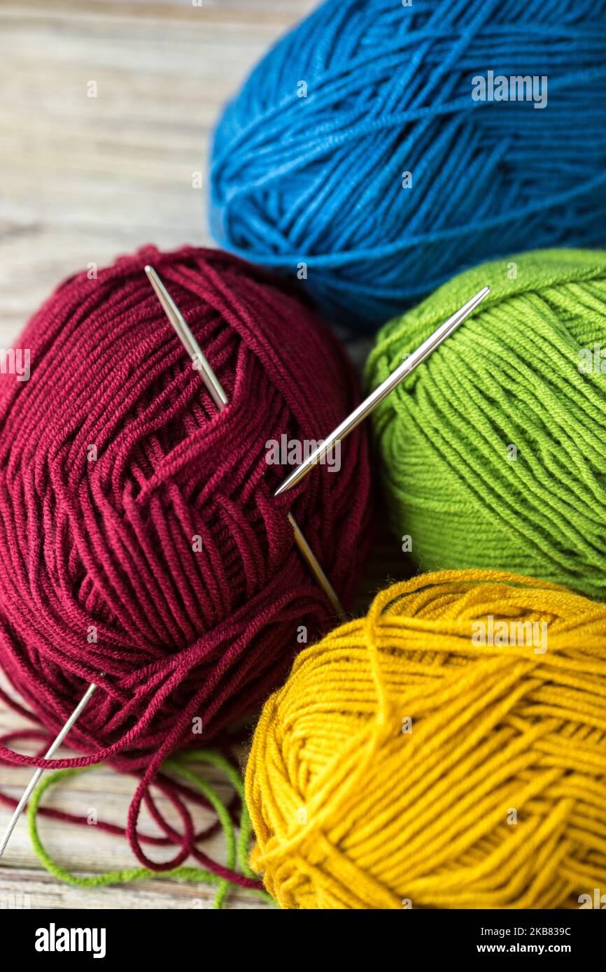 Multi-colored Yarn. Yarn Is Beige, Brown, Grey And White. Knitting Needles,  Scissors, Coffee, Knitting, Knitted Fabric. Stock Photo, Picture and  Royalty Free Image. Image 123527455.