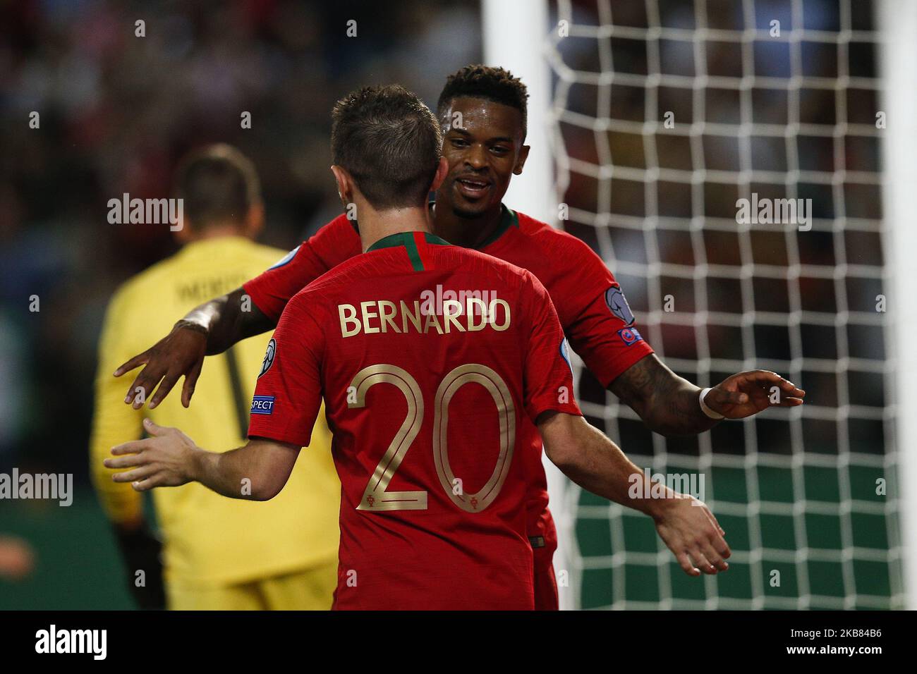Bernardo Silva of Portugal (L) celebrates his goal with Nelson Semedo of Portugal (R) during the Euro 2020 qualifying match football match between Portugal v Luxembourg, in Lisbon, on October 11, 2019. (Photo by Carlos Palma/NurPhoto) Stock Photo