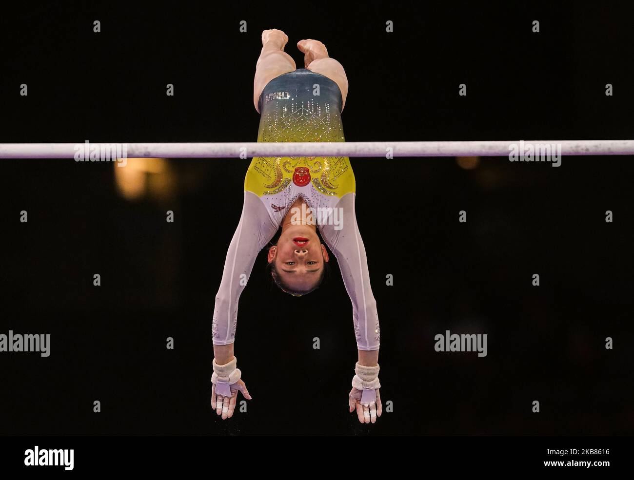 Tingting Liu of China during uneven bars for women at the 49th FIG ...