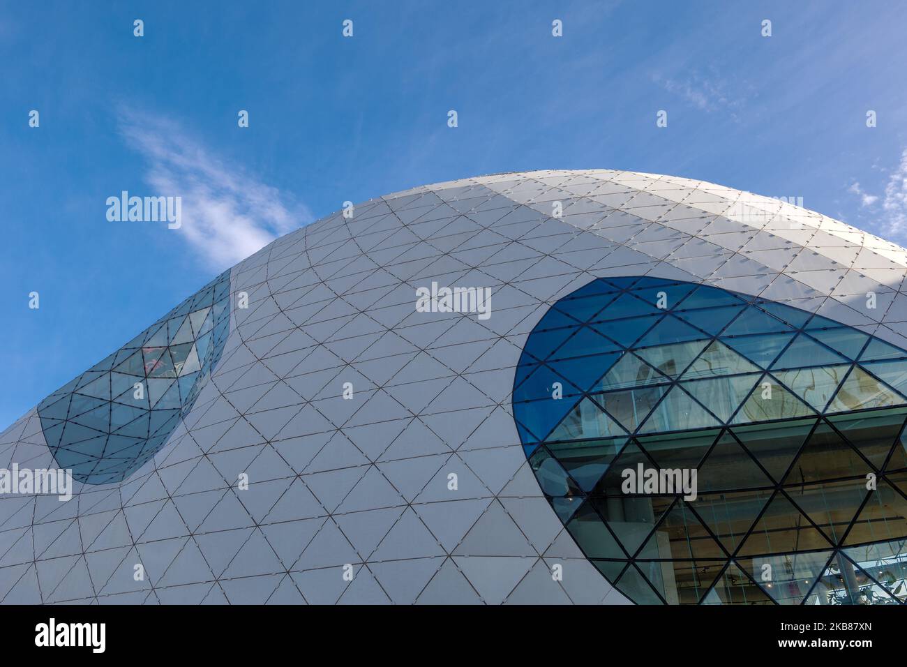 Exterior sunny view of Blob iconic architecture with triangular geometric pattern facade. Stock Photo