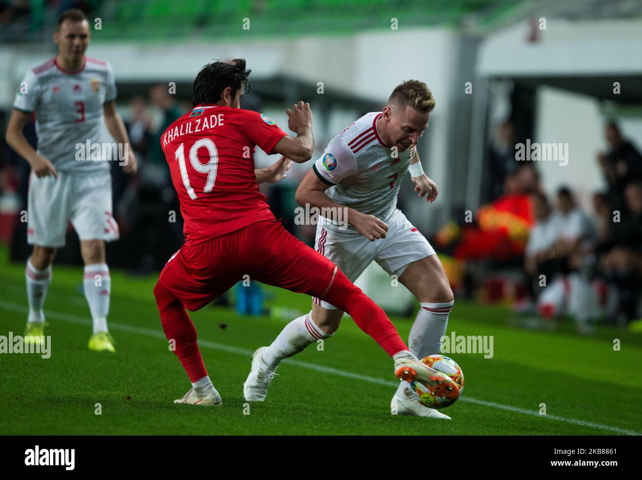 Balazs Dzsudzsak of Hungary competes for the ball with Tamkin ...