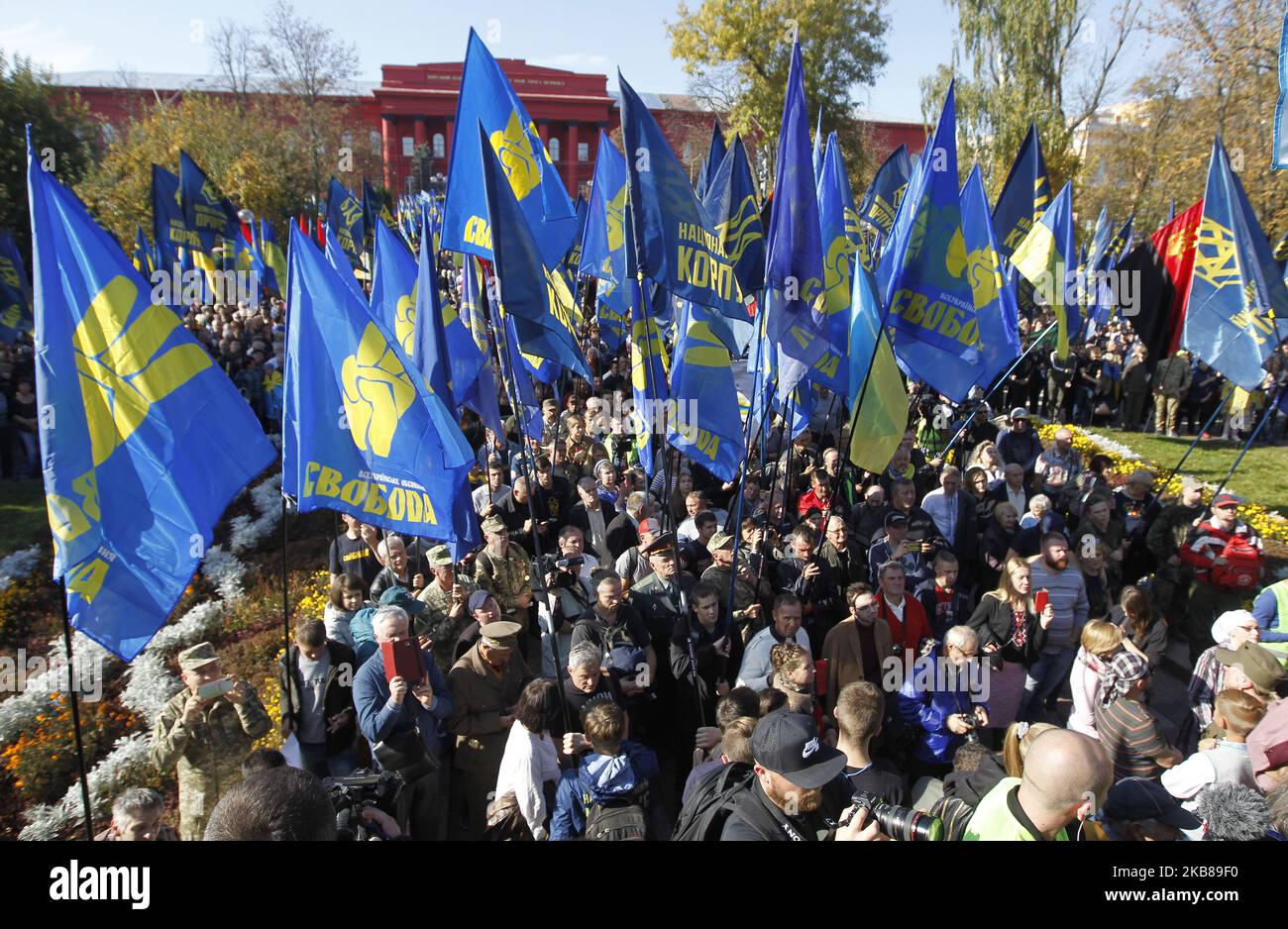 Ukrainians take part at a march to the 77th anniversary of the founding of the Ukrainian Insurgent Army in central Kiev, Ukraine, on 14 October, 2019. Thousands activists of different nationalist parties and movements marched in the center of Ukrainian capital celebrating the founding of the Ukrainian Insurgent Army and Defender of Ukraine Day. The Ukrainian Insurgent Army or UPA fought for Ukrainian independence against the Red Army and the Nazi wermacht during the WWII. (Photo by STR/NurPhoto) Stock Photo