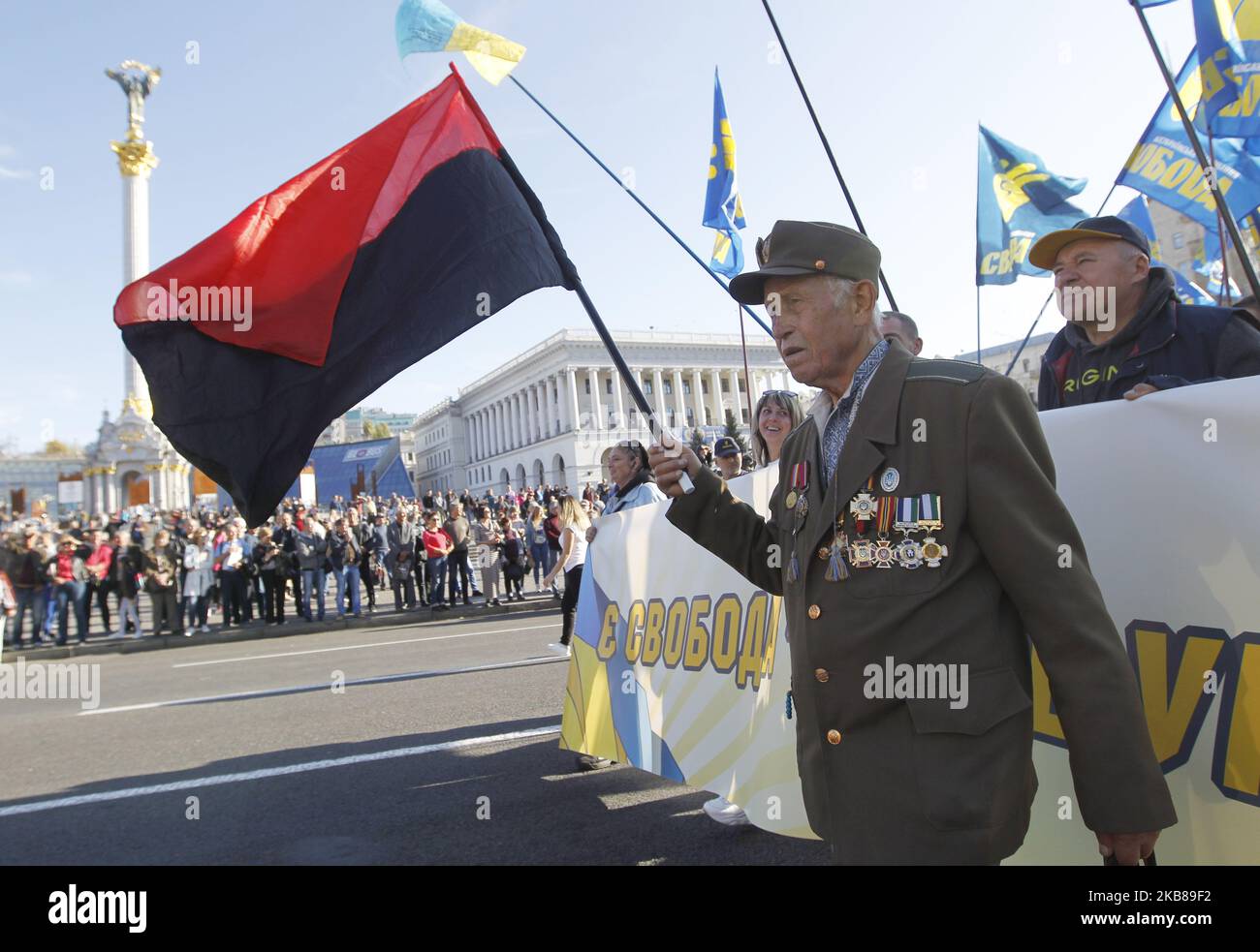 Ukrainians take part at a march to the 77th anniversary of the founding of the Ukrainian Insurgent Army in central Kiev, Ukraine, on 14 October, 2019. Thousands activists of different nationalist parties and movements marched in the center of Ukrainian capital celebrating the founding of the Ukrainian Insurgent Army and Defender of Ukraine Day. The Ukrainian Insurgent Army or UPA fought for Ukrainian independence against the Red Army and the Nazi wermacht during the WWII. (Photo by STR/NurPhoto) Stock Photo