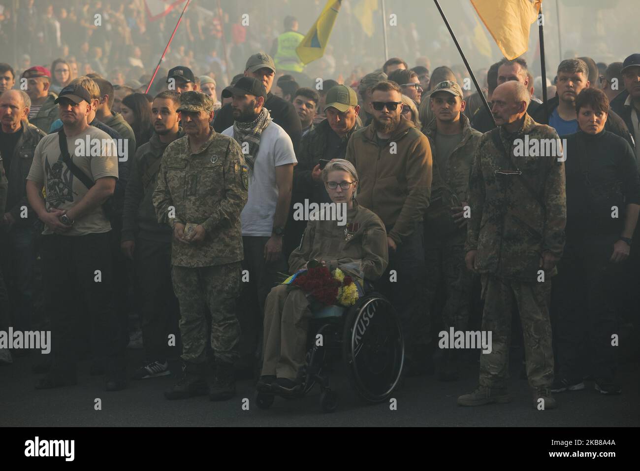 Veteran and lawmaker Yana Zinkevych (on a wheelchair) attends a rally in Kyiv, Ukraine, October 14, 2019. Several Thousand Ukrainians attend the March Against Capitulation and Surrender of State Interests on October 14, when Ukraine marks the Day of Defender. (Photo by Sergii Kharchenko/NurPhoto) Stock Photo