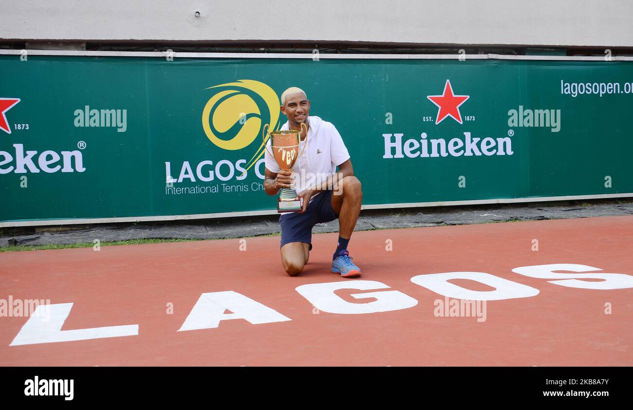 French Calvin Hemery poses with trophy after win the Men's single final