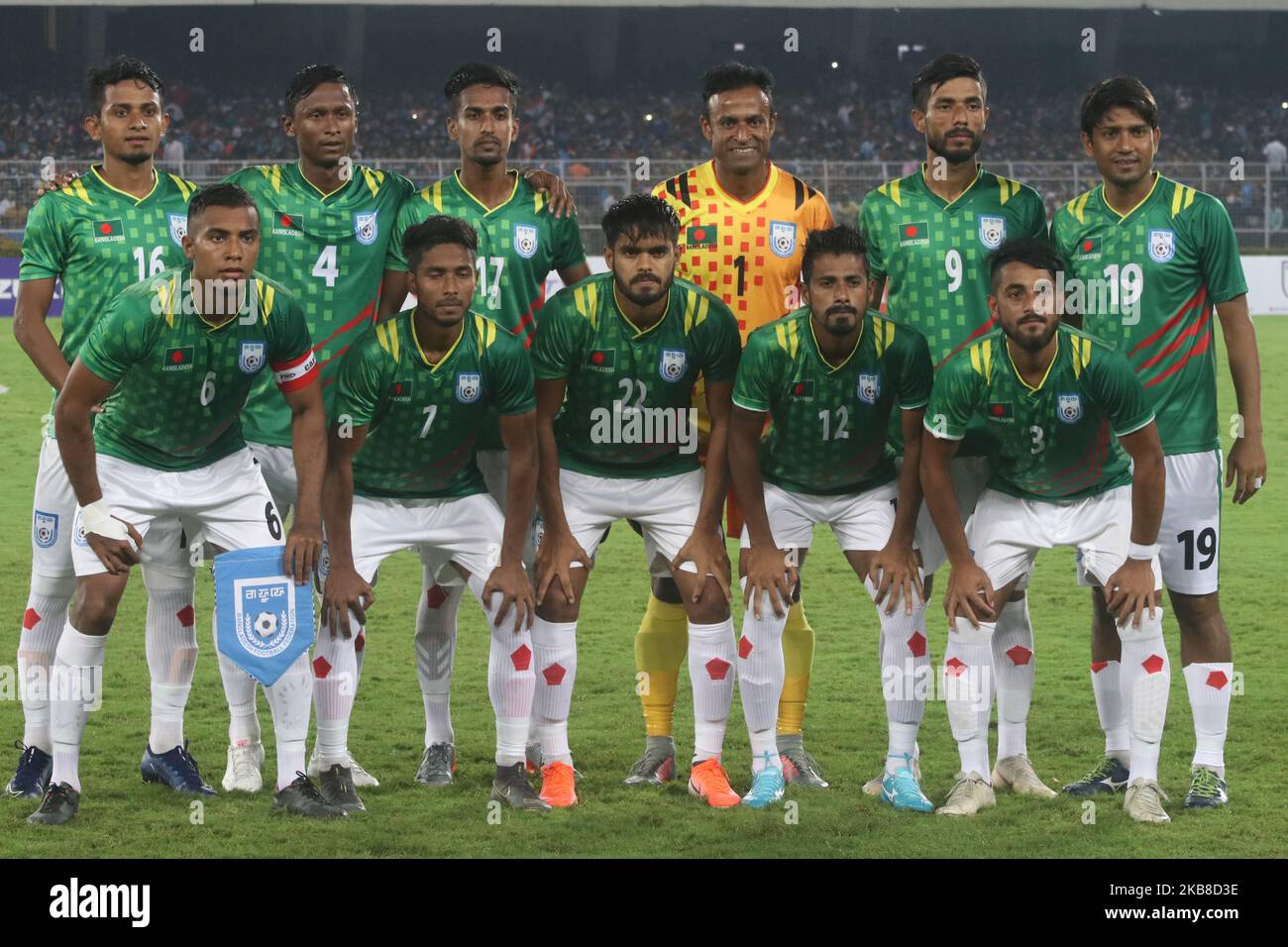 Bangladesh's national football team members pose for a picture ahead of