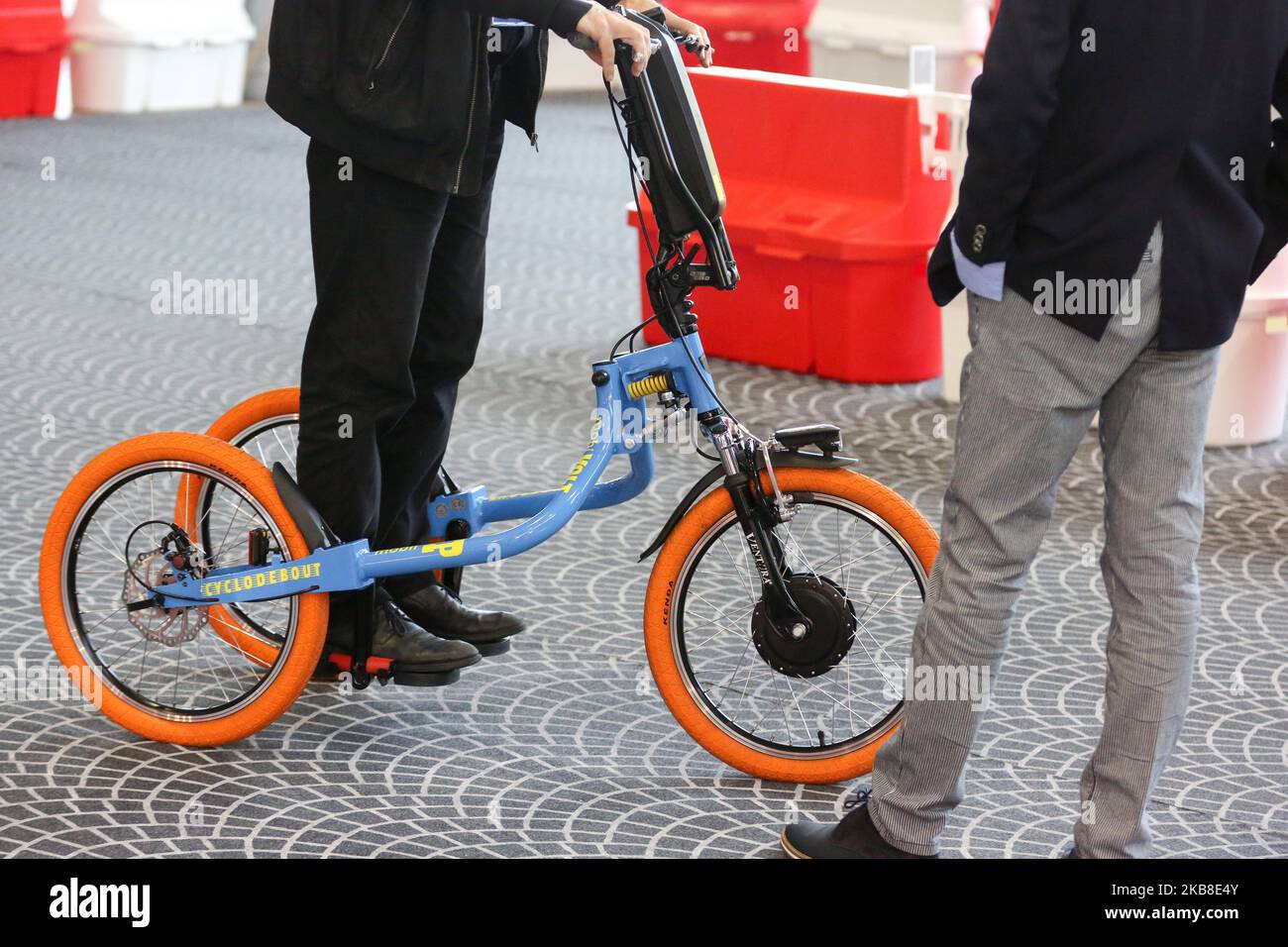 The French manufacturer Le Cyclodebout exhibits an electric trike at the Autonomy and Urban Mobility show, in Paris on October 16, 2019. (Photo by Michel Stoupak/NurPhoto) Stock Photo