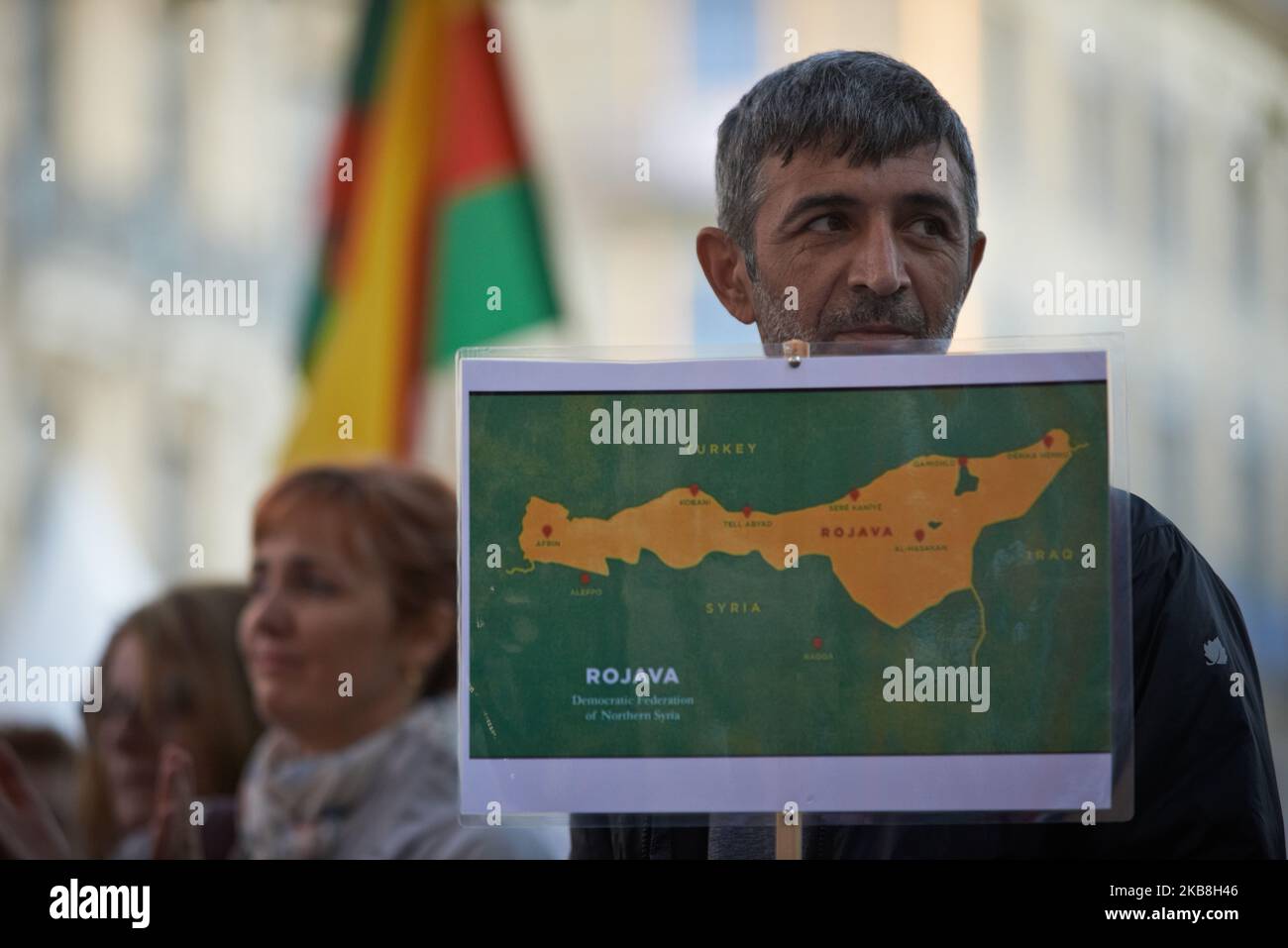 A Kurd holds a map of the Syrian Kurdistan (Rojava as Kurds call it'. As Turkey attacked Kurdish militia positions in northeast Syria, Toulouse' Kurdish people gathered in support of the Syrian Kurdistan (Rojava as Kurds call it) and against the Turkish offensive. They called on President Macron to intervene at the UN and asked the EU to condemn the Turkish military attack. Kurds prepare other protests even if US vice-president Mike Pence says he has reached an agreement with Turkish President Erdogan on a ceasefire of 5 days. Toulouse. France. October 17th 2019. (Photo by Alain Pitton/NurPhot Stock Photo
