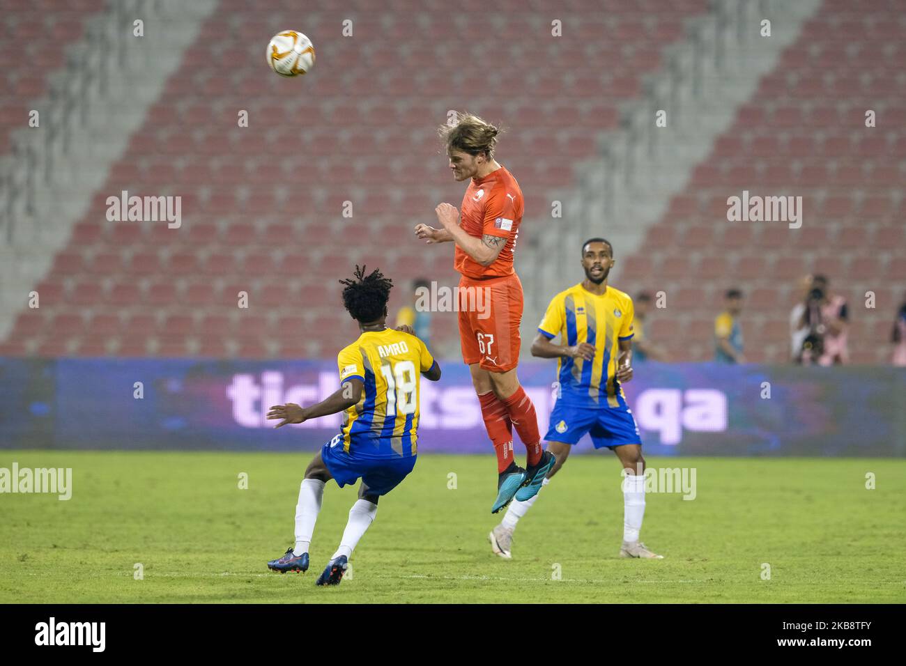 Al Arabi's Birkir Bjarnason heads clear during the QNB Stars League match against Al Gharafa on October 20 2019 at the Grand Hamad Stadium in Doha, Qatar. (Photo by Simon Holmes/NurPhoto) Stock Photo