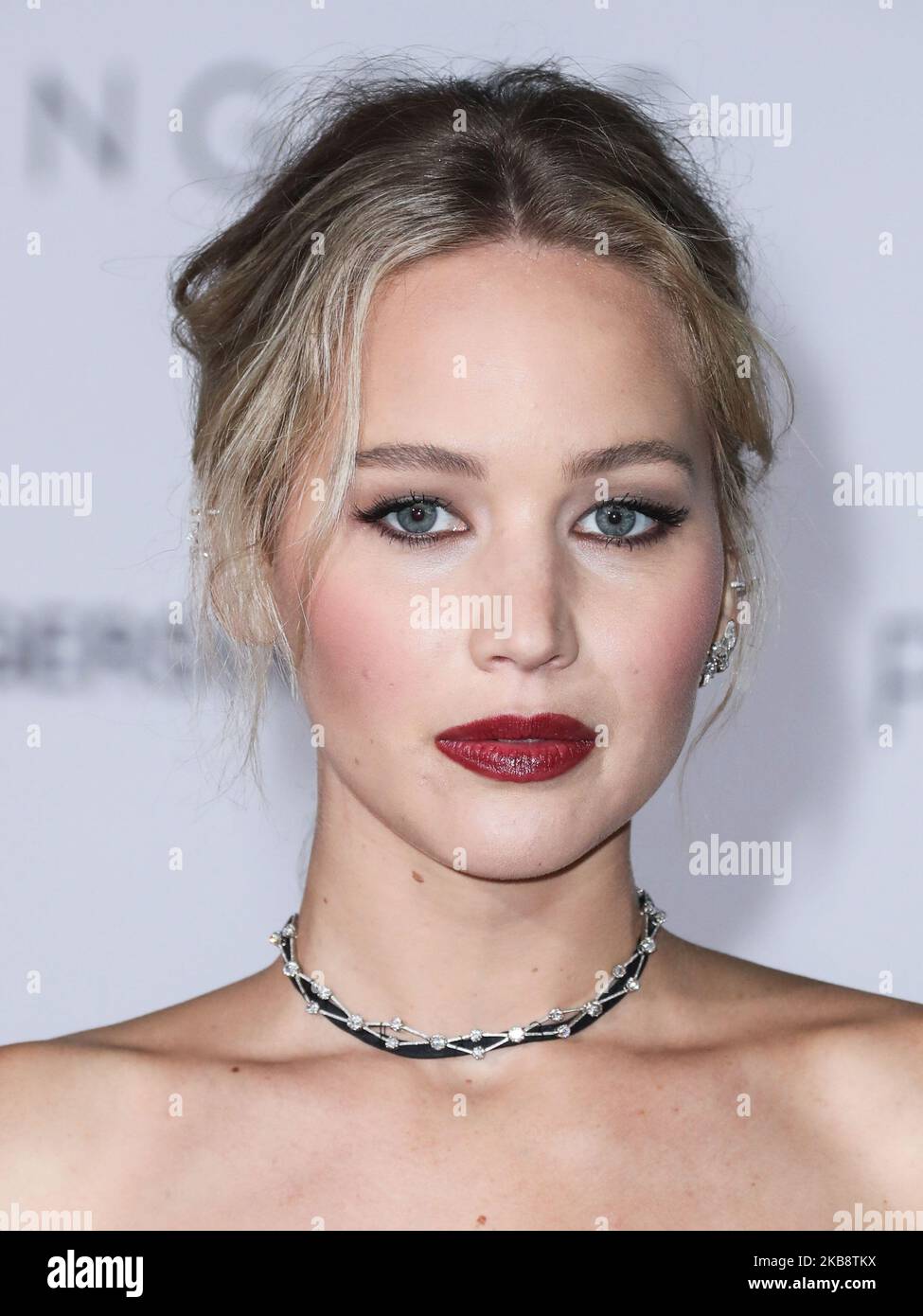 (FILE) Jennifer Lawrence marries Cooke Maroney. Jennifer Lawrence and Cooke Maroney tied the knot Saturday night at Belcourt of Newport, a pretty spectacular Rhode Island mansion. Among the guests were Ashley Olsen, Kris Jenner, Emma Stone, Corey Gamble, Cameron Diaz, Nicole Richie and Sienna Miller. WESTWOOD, LOS ANGELES, CALIFORNIA, USA - DECEMBER 14: Actress Jennifer Lawrence wearing a Dior dress, Christian Louboutin, and Beladora and Repossi jewels arrives at the World Premiere Of Columbia Pictures 'Passengers' held at the Regency Village Theatre on December 14, 2016 in Westwood, Los Angel Stock Photo