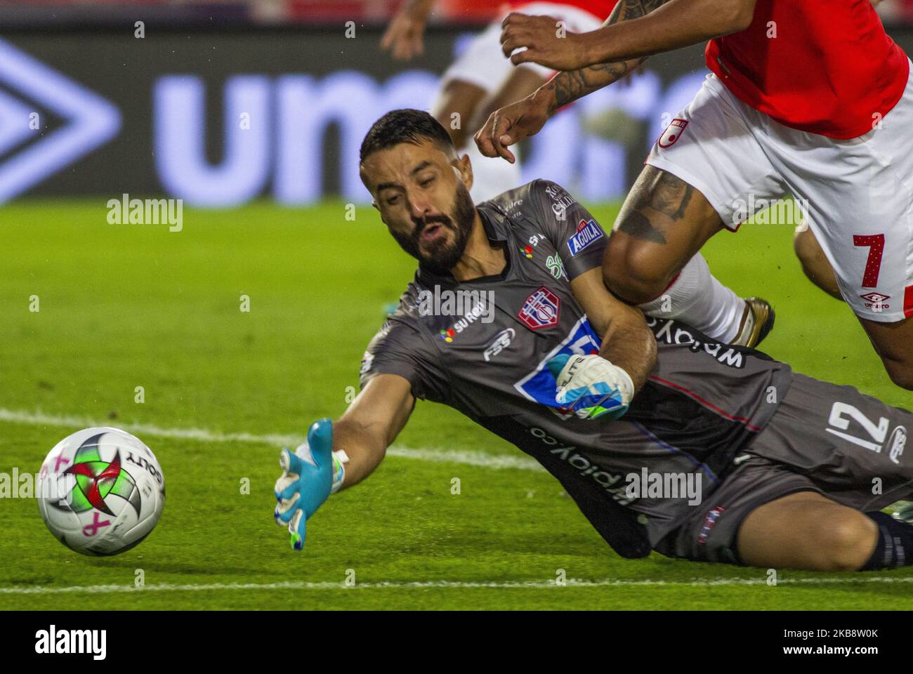 Cesar Giraldo goalkeeper of Union Magdalena saves the ball during the match between Independiente Santa Fe and Union Magdalena as part of the Liga Aguila 2019 at stadio Nemesio Camacho on October 20, 2019 in Bogota, Colombia. (Photo by Daniel Garzon Herazo/NurPhoto) Stock Photo