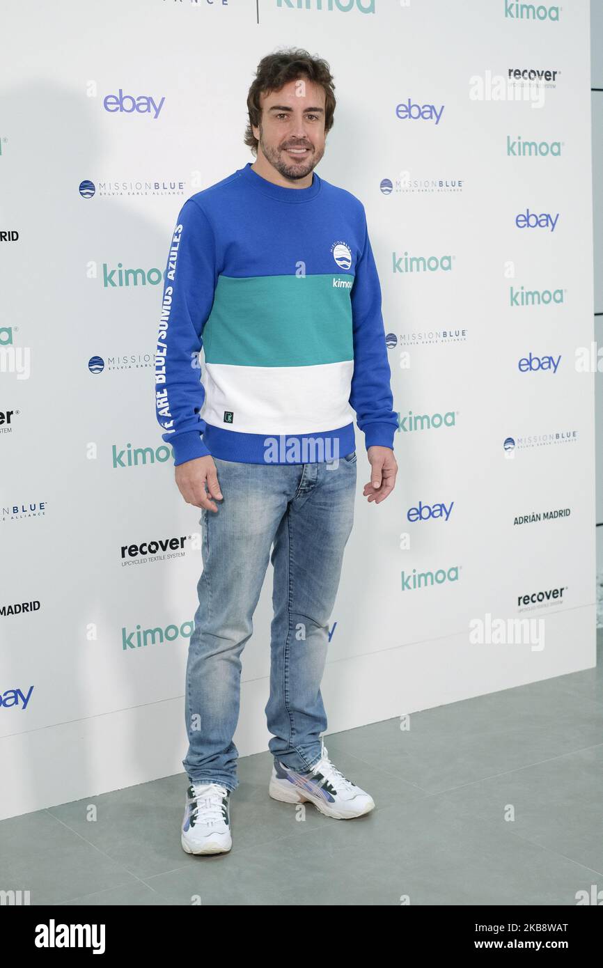 Spanish driver Fernando Alonso, two-times World F-1 Champion, poses for the photographers as he presents the project 'Mission Blue x Kimoa' at eBay headquarters in Madrid, Spain, 21 October 2019. According to the official website, Mission Blue inspires action to explore and protect the ocean. Led by legendary oceanographer Dr. Sylvia Earle, Mission Blue is uniting a global coalition to inspire an upwelling of public awareness, access and support for a worldwide network of marine protected areas. (Photo by Oscar Gonzalez/NurPhoto) Stock Photo