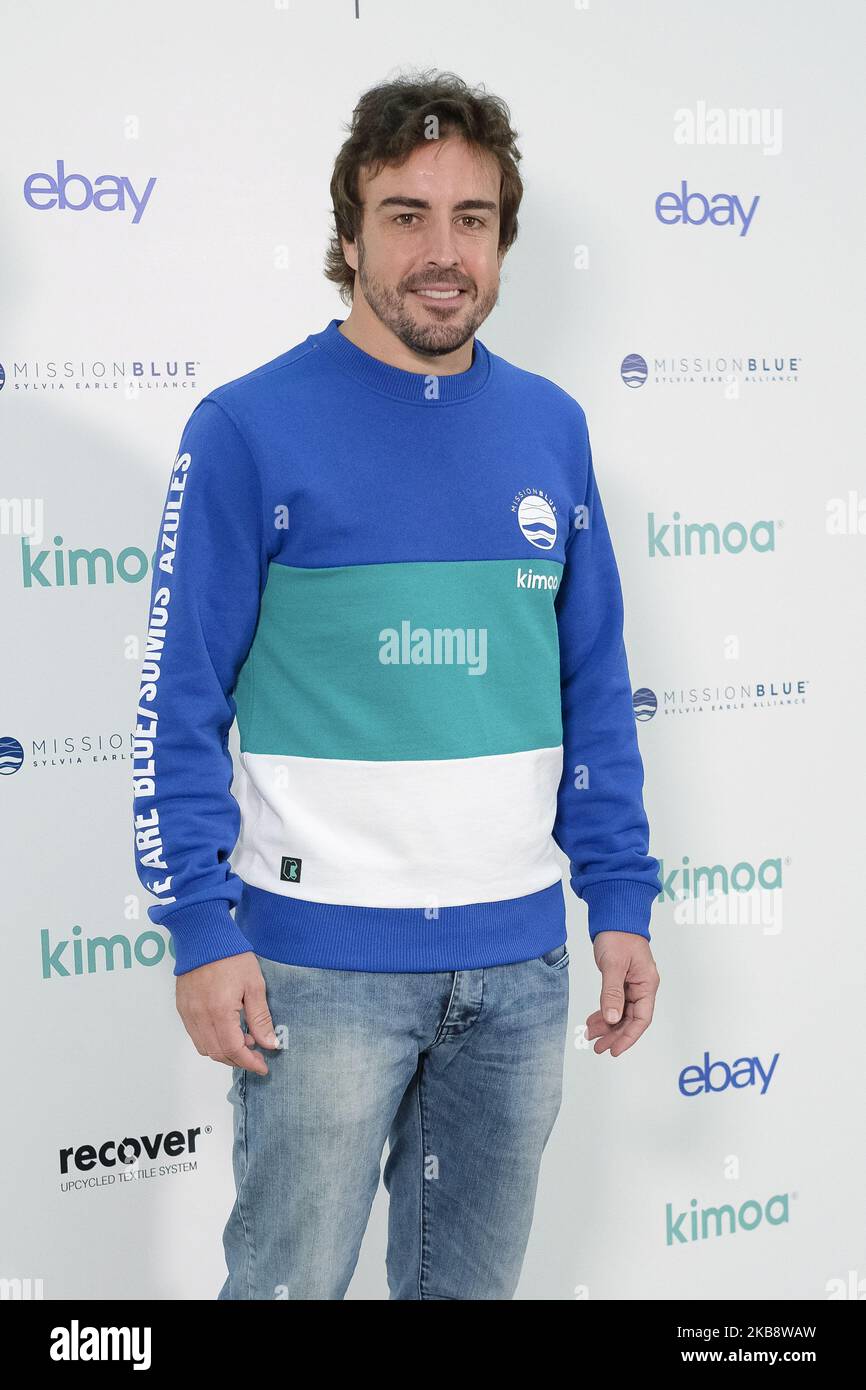 Spanish driver Fernando Alonso, two-times World F-1 Champion, poses for the photographers as he presents the project 'Mission Blue x Kimoa' at eBay headquarters in Madrid, Spain, 21 October 2019. According to the official website, Mission Blue inspires action to explore and protect the ocean. Led by legendary oceanographer Dr. Sylvia Earle, Mission Blue is uniting a global coalition to inspire an upwelling of public awareness, access and support for a worldwide network of marine protected areas. (Photo by Oscar Gonzalez/NurPhoto) Stock Photo