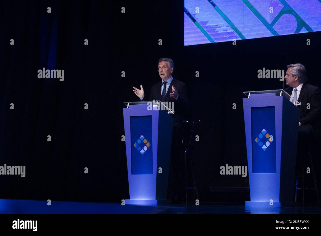 Mauricio Macri, Argentina's president, left, speaks while Alberto Fernandez, presidential candidate for Frente de Todos party, listens during a presidential candidate debate in Buenos Aires, Argentina, on Sunday, Oct. 20, 2019. (Photo by Matías Baglietto/NurPhoto) Stock Photo