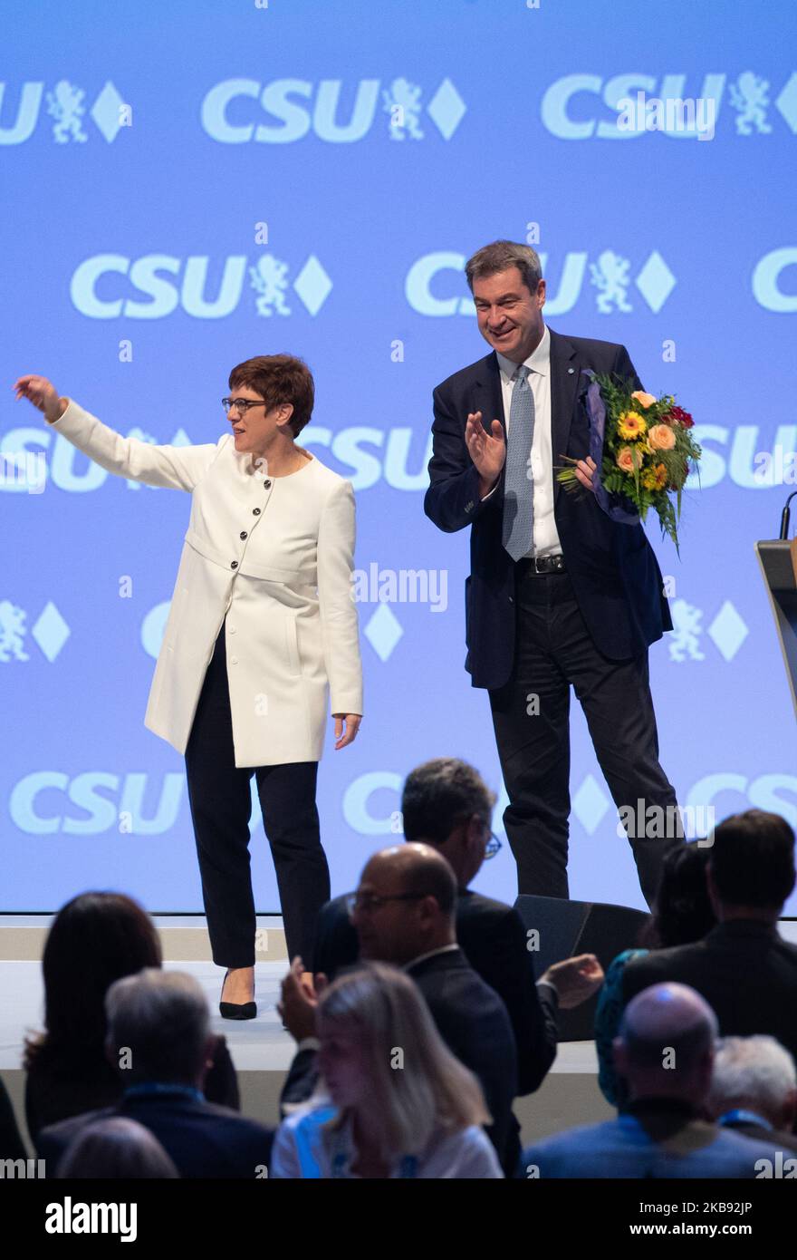 German MInister of Defense and CDU Chairwoman Annegret Kramp-Karrenbauer ( AKK ) and the Bavarian Prime Minsiter and CSU Chairman Markus Soeder at the stage of the party congress of the Christian Social Union on 19. October 2019 in the Munich Olympic Hall. The party will vote a new board. (Photo by Alexander Pohl/NurPhoto) Stock Photo