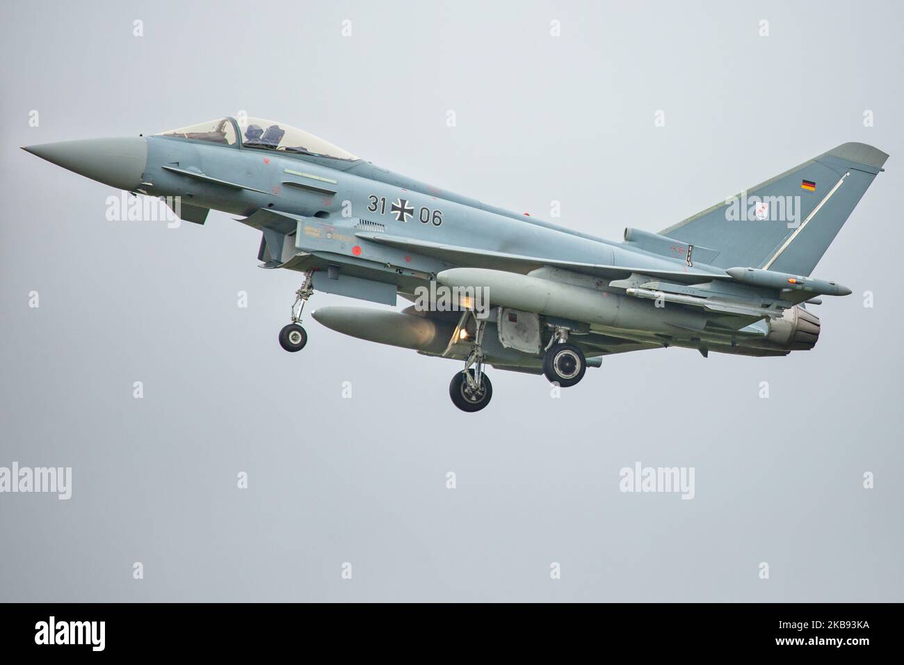 Eurofighter EF-2000 Typhoon of the German Air Force Luftwaffe with registration 31+06 ( 3106 ) as seen flying on final approach and landing at Kleine Brogel Military Air Base EBBL airport in Belgium before the International Sanicole Airshow at Sanicole Airfield Vliegveld at Hechtel - Eksel / Leopoldsburg / Beverlo Airfield EBLE a former Belgian military airfield. The plane will be in a static exhibition and flying demonstration at the air show. Kleine Brogel, Belgium - September 13, 2019 (Photo by Nicolas Economou/NurPhoto) Stock Photo