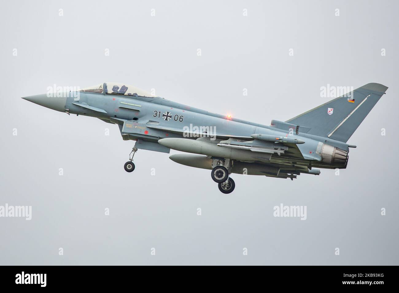 Eurofighter EF-2000 Typhoon of the German Air Force Luftwaffe with registration 31+06 ( 3106 ) as seen flying on final approach and landing at Kleine Brogel Military Air Base EBBL airport in Belgium before the International Sanicole Airshow at Sanicole Airfield Vliegveld at Hechtel - Eksel / Leopoldsburg / Beverlo Airfield EBLE a former Belgian military airfield. The plane will be in a static exhibition and flying demonstration at the air show. Kleine Brogel, Belgium - September 13, 2019 (Photo by Nicolas Economou/NurPhoto) Stock Photo