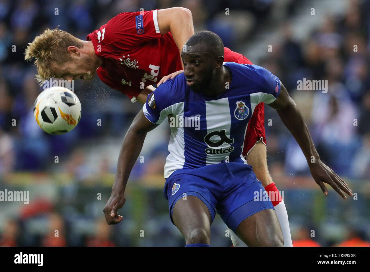 Porto’s Malian forward Moussa Marega (R) vies with Filip Helander defender of Rangers FC (L) during the UEFA Europa League group G match between FC Porto and Rangers FC, at Dragao Stadium on October 24, 2019 in Porto, Portugal. (Photo by Paulo Oliveira / DPI / NurPhoto) Stock Photo