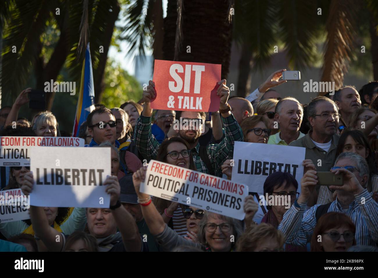 Thousands of people demonstrate in the streets of Barcelona on October 26, 2019 with posters of freedom, freedom political prisoners and sit down to talk during the demonstration that has taken place in Barcelona and when more than 350,000 people have taken to the street to show their rejection of the judgment of the supreme court in which it condemns between independence and thirteen years to the independentistas leaders. (Photo by Charlie Perez/NurPhoto) Stock Photo