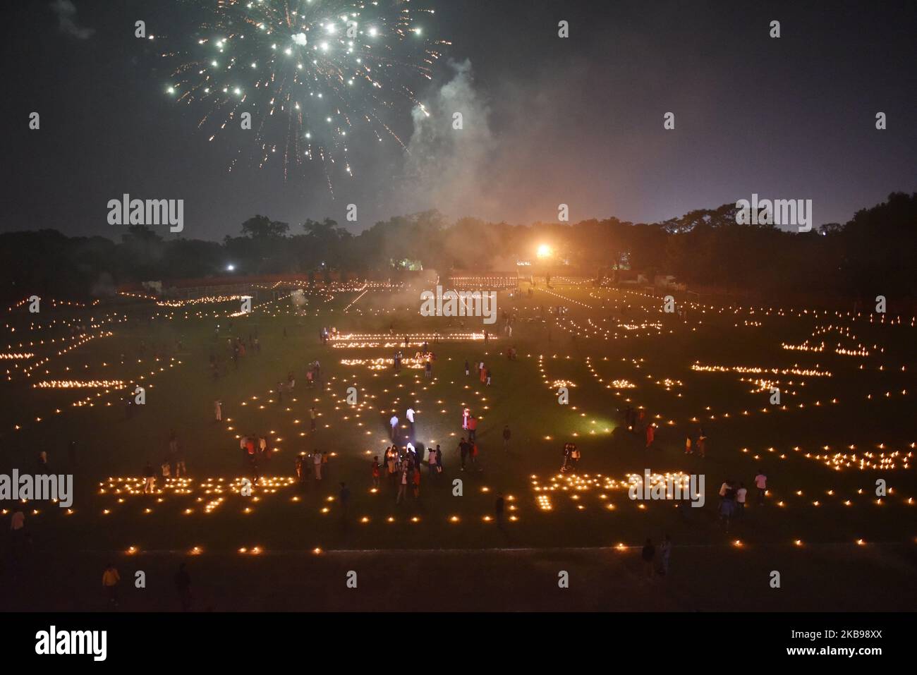 indian-athletes-watch-fireworks-at-the-madan-mohan-malviya-stadium-on