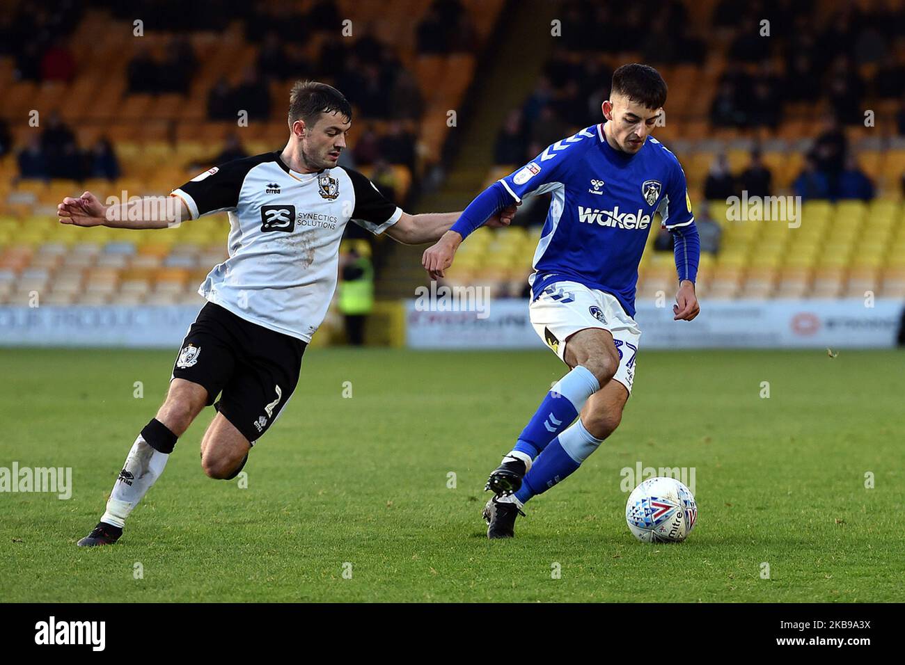 Port Vale's James Gibbons and Oldham's Lewis McKinney in action during the Sky Bet League 2 match between Port Vale and Oldham Athletic at Vale Park, Burslem on Saturday 26th October 2019. (Photo by Eddie Garvey/MI News/NurPhoto) Stock Photo
