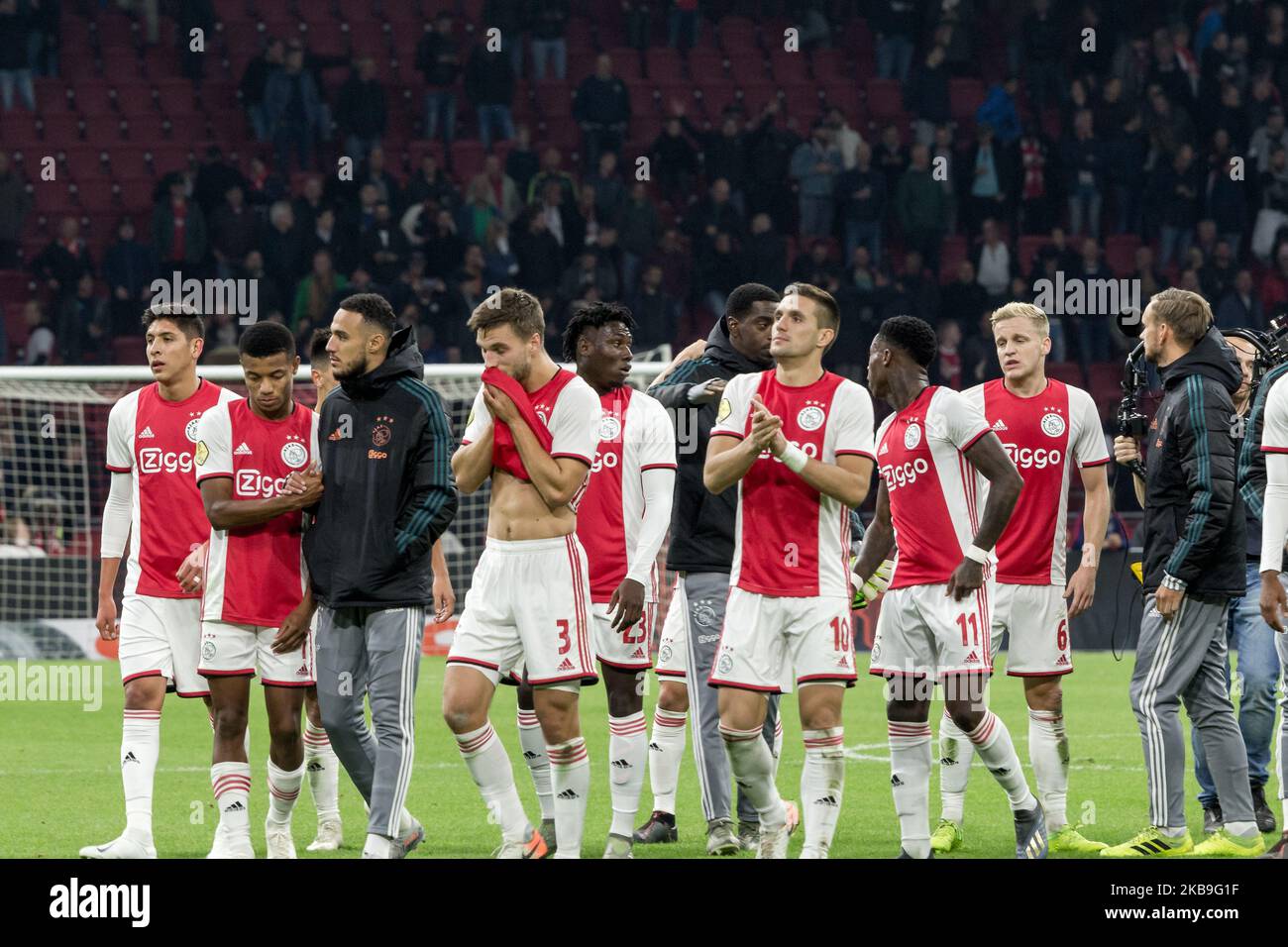 The players of Amsterdam celebrate after winning the eredivisie match between Ajax Amsterdam and Feyenoord Rotterdam at the Johan-Cruyff-Arena on October 27, 2019 in Amsterdam, Netherland. (Photo by Peter Niedung/NurPhoto) Stock Photo