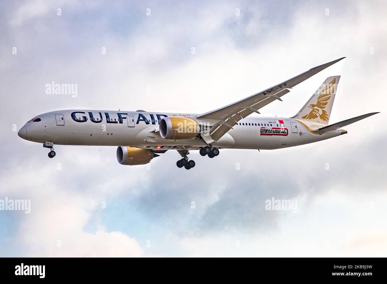 Gulf Air Boeing 787-9 Dreamliner aircraft as seen on final approach landing at London Heathrow International Airport EGLL LHR, during a cloudy morning in the day. The Boeing 787 Dreamliner airplane has the registration A9C-FF, 2x RR jet engines and Formula 1 Gulf Air Bahrain Grand Prix sticker on the fuselage. Gulf aur GF GFA is the flag carrier of the Kingdom of Bahrain connecting BAH OBBI airport to the British capital. (Photo by Nicolas Economou/NurPhoto) Stock Photo