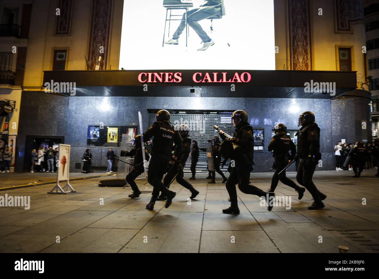 Spanish riot policemen charge on demonstrators in Plaza de Callao ...