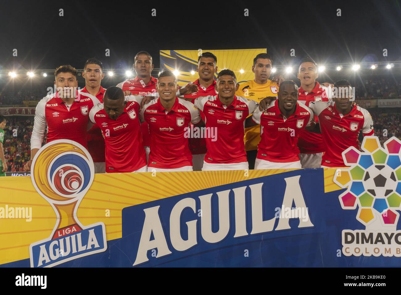Independiente Santa Fe players pose for the photo before the game against Atletico Nacional during a match between Independiente Santa Fe and Atletico National as part of the Torneo Clausura Liga Aguila at Estadio El Campin on October 29, 2019 in Bogota, Colombia. (Photo by Daniel Garzon Herazo/NurPhoto) Stock Photo