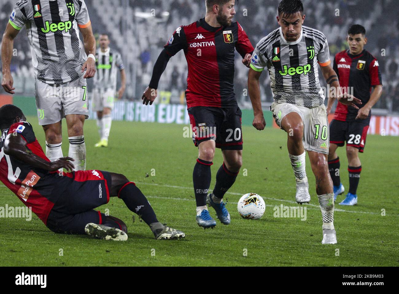 Genoa defender Cristian Zapata (2) tackles Juventus forward Paulo Dybala (10) during the Serie A football match n.10 JUVENTUS - GENOA on October 30, 2019 at the Allianz Stadium in Turin, Piedmont, Italy. Final result: Juventus-Genoa 2-1. (Photo by Matteo Bottanelli/NurPhoto) Stock Photo