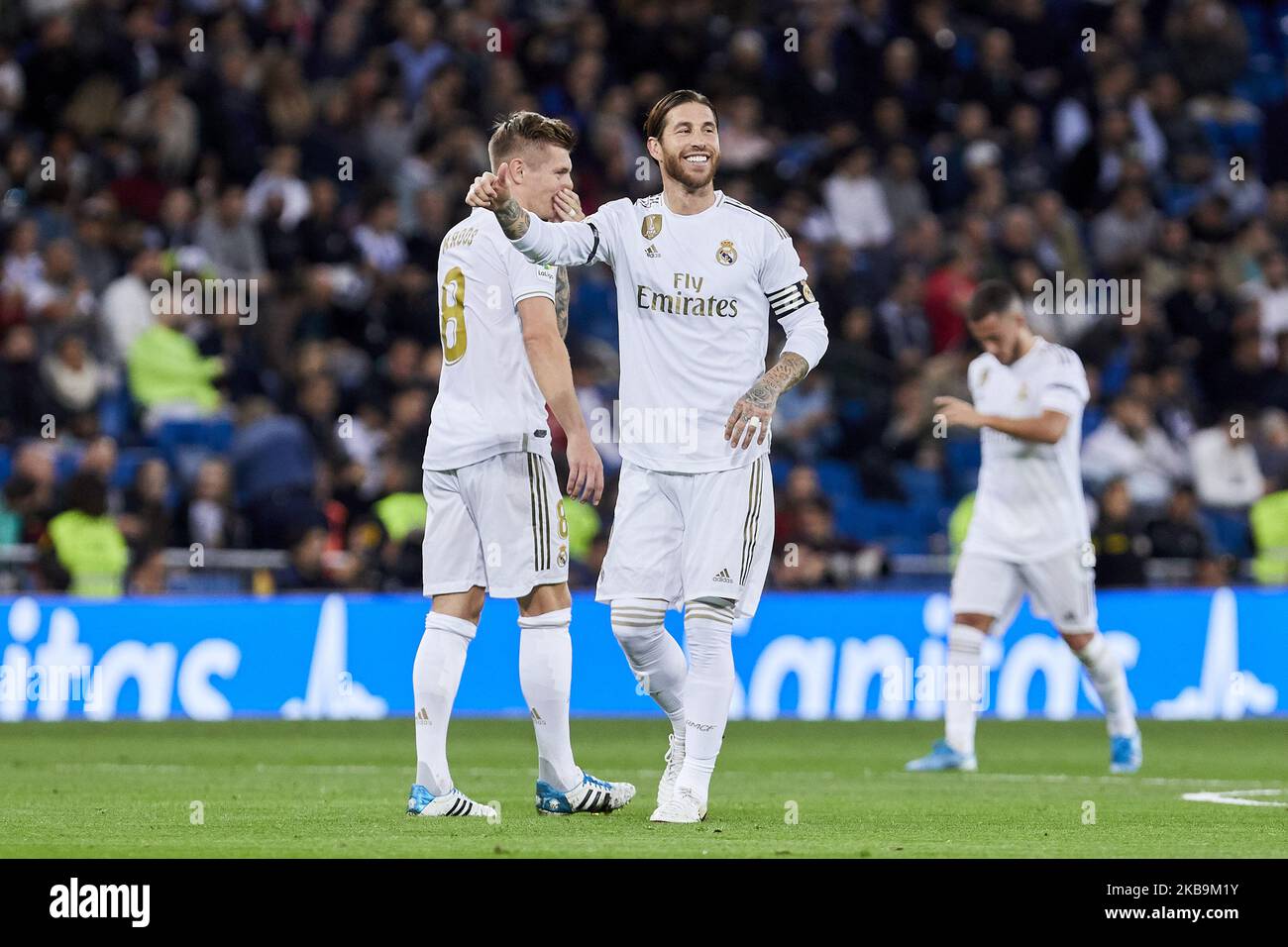 Toni Kroos (L) and Sergio Ramos (R) of Real Madrid celebrate goal during La Liga match between Real Madrid and CD Leganes at Santiago Bernabeu Stadium in Madrid, Spain. October 30, 2019. (Photo by A. Ware/NurPhoto) Stock Photo