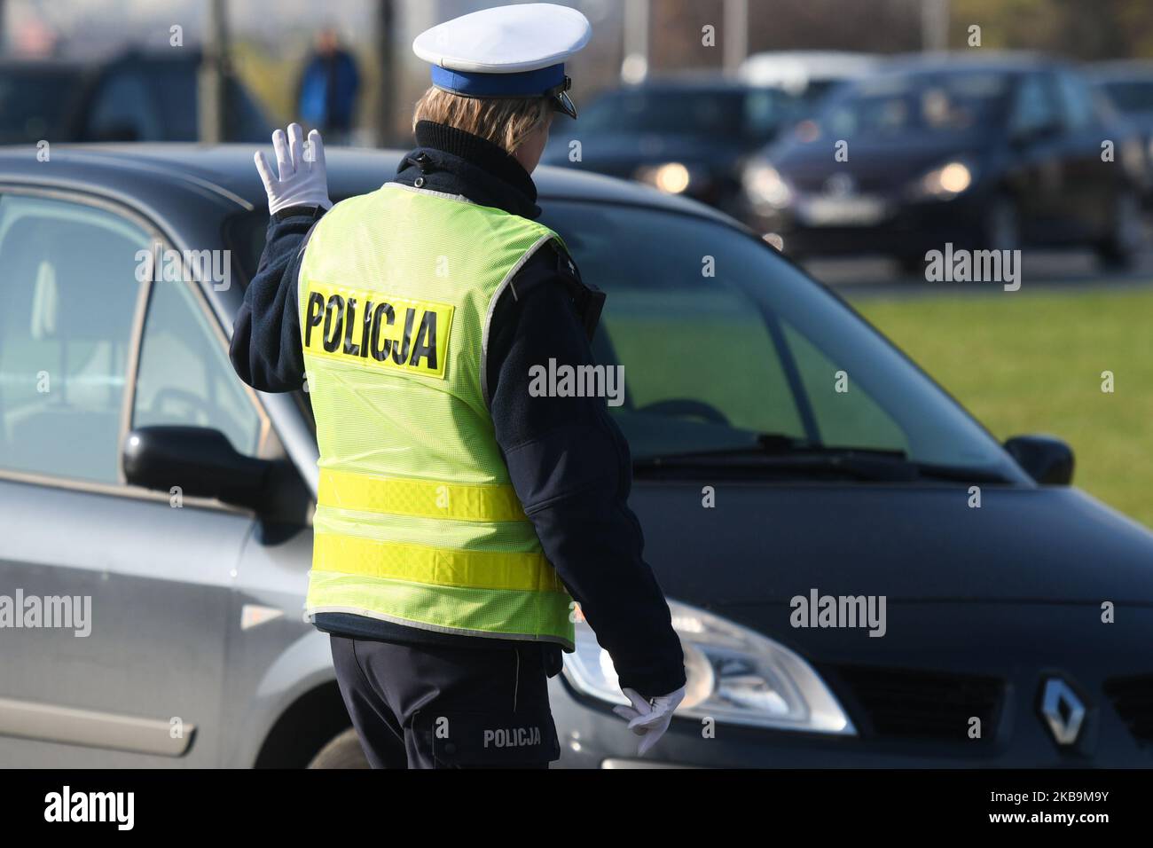 A member of Rzeszow Police Units during 'Candle 2019 Action' (Polish: Akcja Znicz) - an annual campaign organized by the police during All Saints' Day. On the 1st November, All Saints Day, many people in Poland pay respects to dead family members. The 1st of November is a day off from work, and many travel to visit the graves of their loved ones. During the preceeding week, all tombs are cleaned, and many flowers and candles are placed on top of tombs. On Thursday, October 31, 2019, in Rzeszow, Poland. (Photo by Artur Widak/NurPhoto) Stock Photo