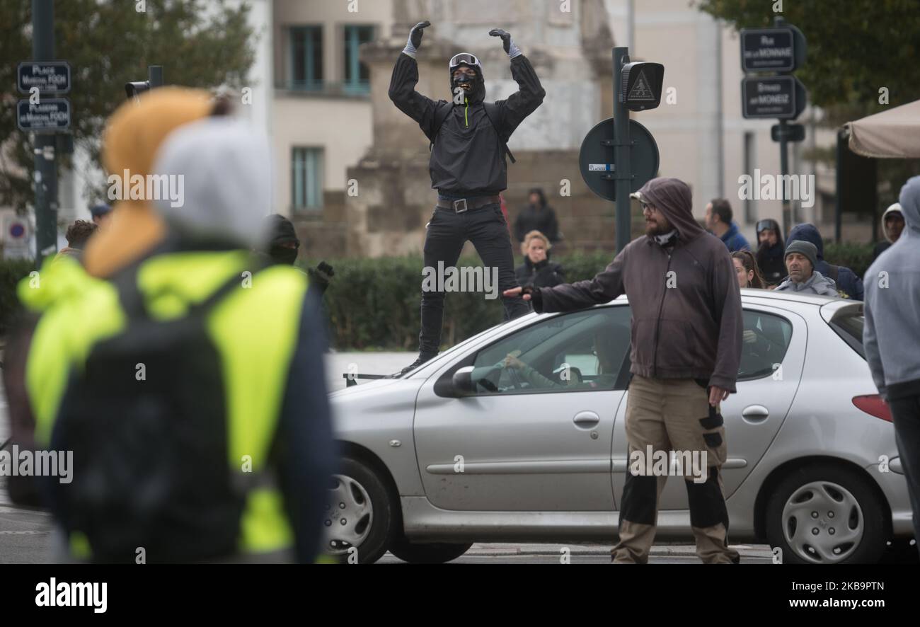 Saturday, November 2, 2019, for Act 51, a hundred yellow vests (gilets  jaunes) demonstrated in Rennes (France) two weeks from the first year of  the movement. Extreme-leftist activists dressed in black (black-bloc)