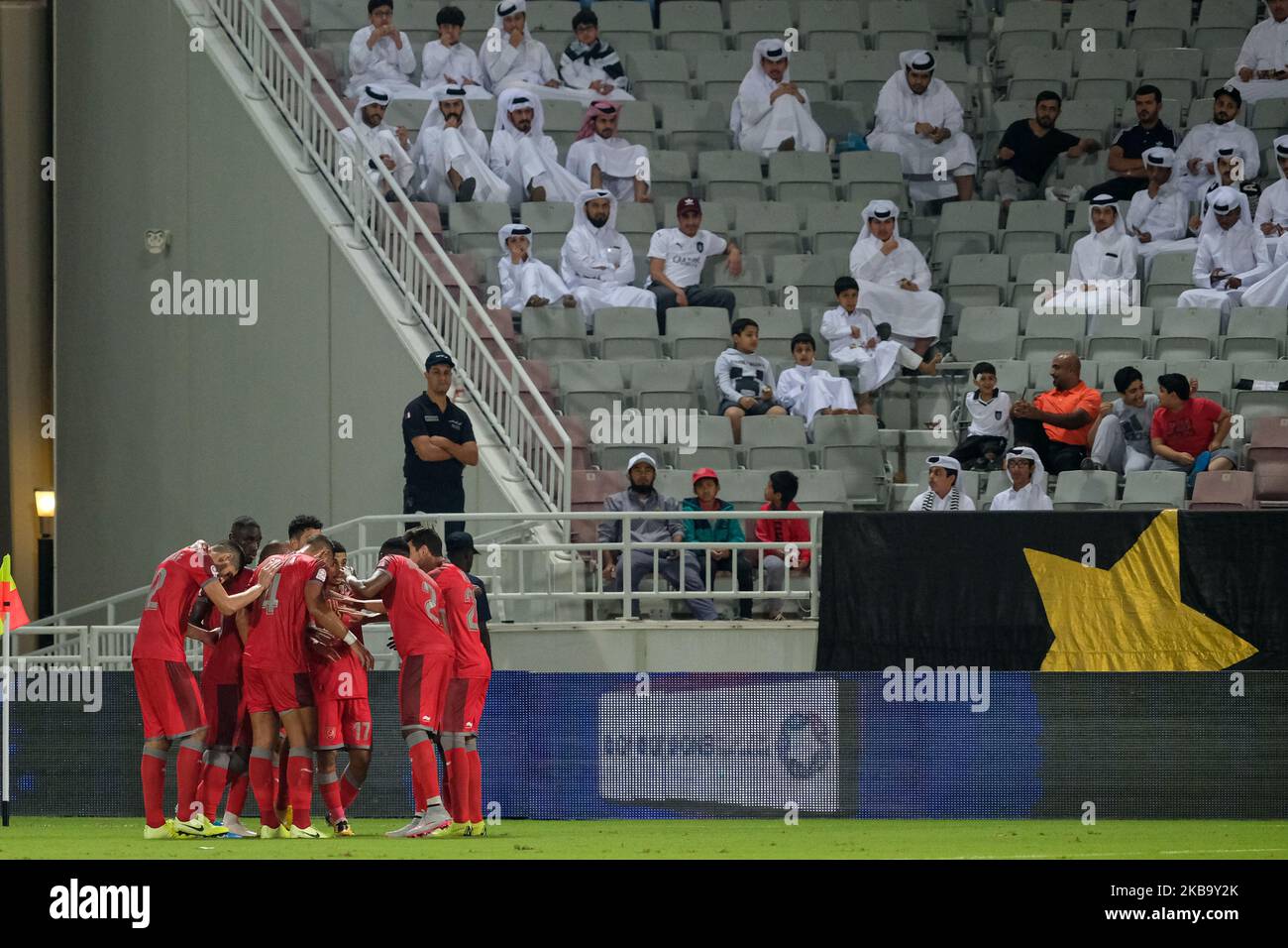 Al Duhail celebrate Karim Boudiaf's headed goal during the QNB Stars League match against Al Sadd at the Abdullah bin Khalifa Stadium in Doha, Qatar on 3 November 2019. (Photo by Simon Holmes/NurPhoto) Stock Photo