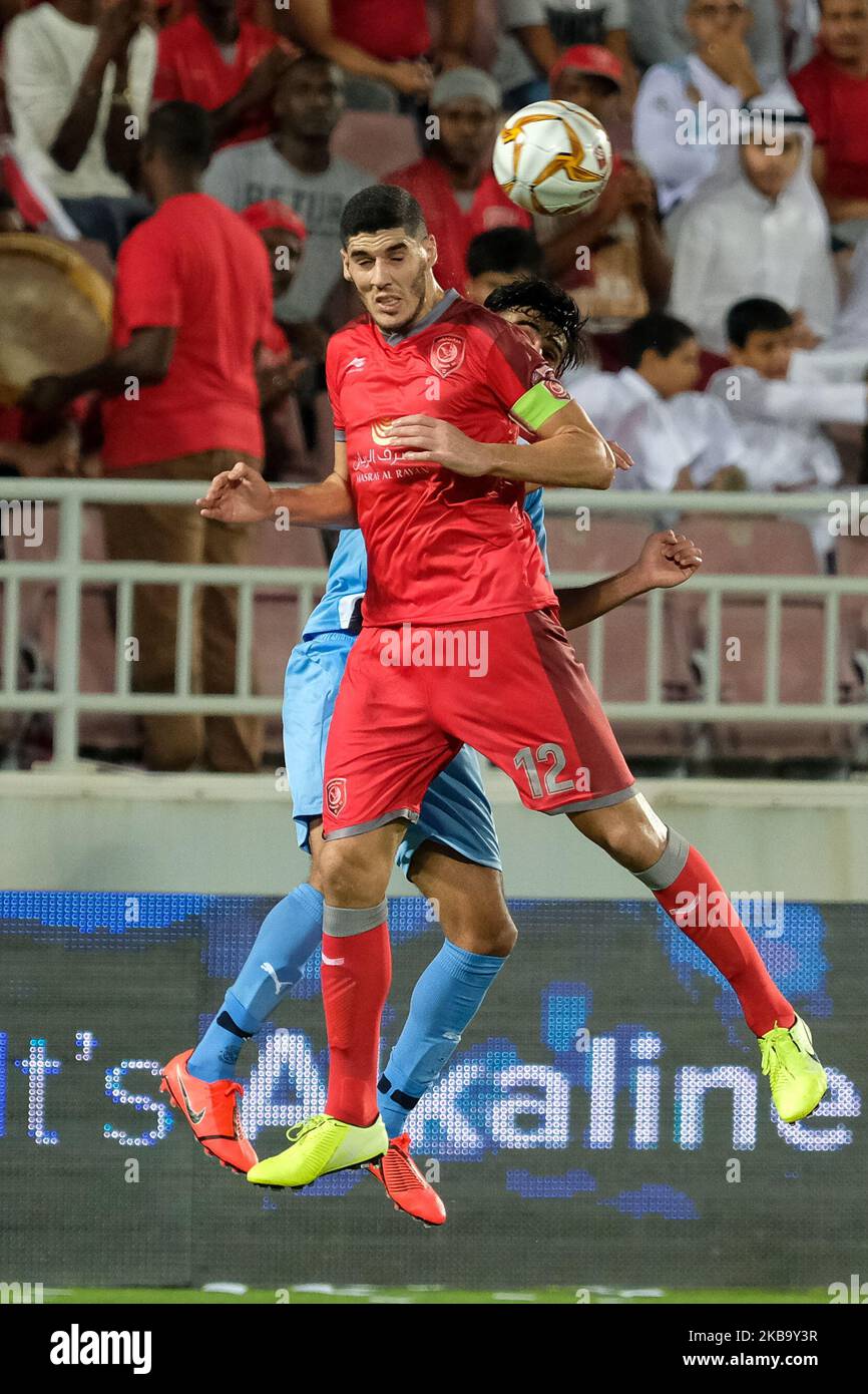 Al Duhail's Karim Boudiaf wins a header at the Abdullah bin Khalifa Stadium in Doha, Qatar on 3 November 2019. (Photo by Simon Holmes/NurPhoto) Stock Photo