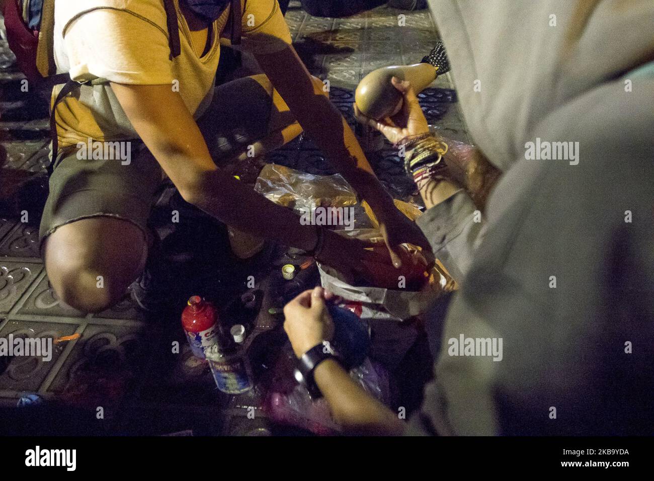 Proindependence activists of Catalonia, throw balloons with paint on the doors of the Catalan Ministry of Interior against the police that protect it in Barcelona, ??Catalonia, Spain on October 21, 2019. (Photo by Miquel Llop/NurPhoto) Stock Photo