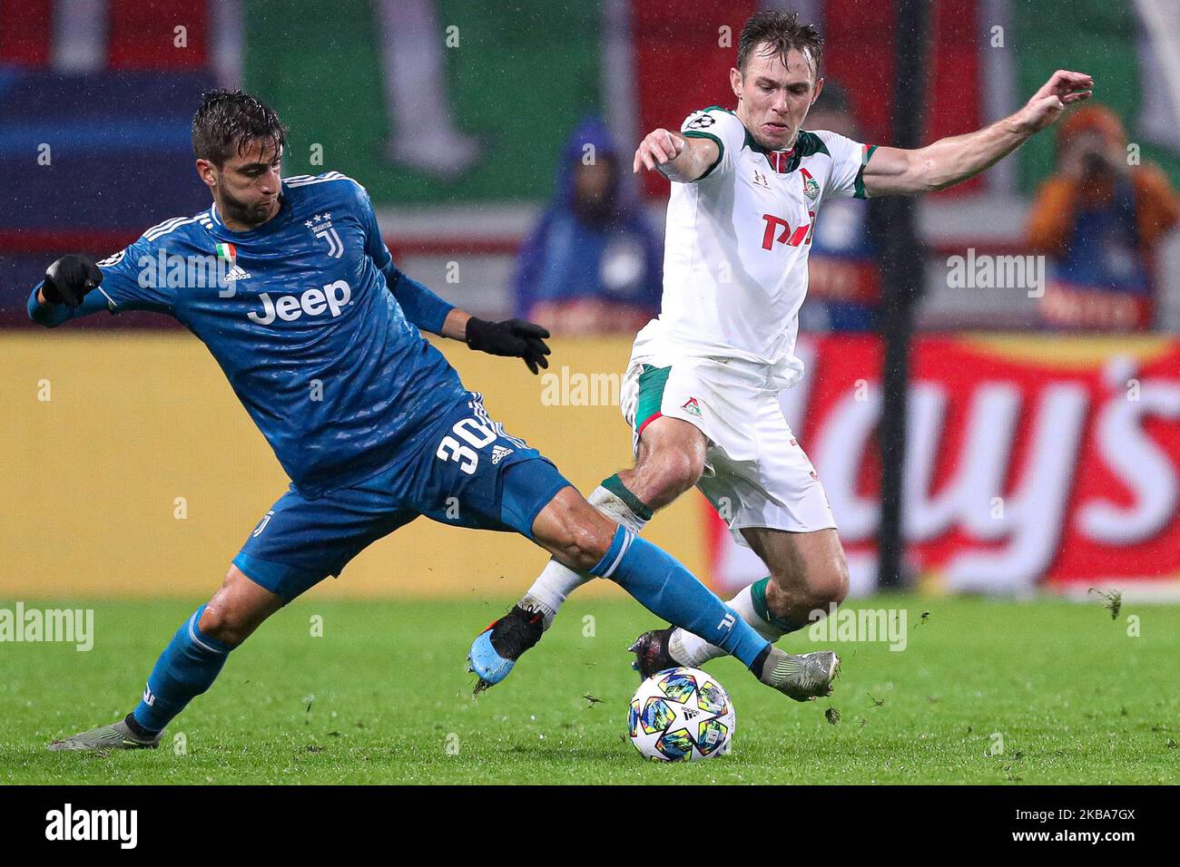 Maciej Rybus of FC Lokomotiv Moskva (R) and Rodrigo Bentancur of Juventus vie for the ball during the UEFA Champions League group D match between FC Lokomotiv Moskva and Juventus at RZD Arena on November 06, 2019 in Moscow, Russia. (Photo by Igor Russak/NurPhoto) Stock Photo