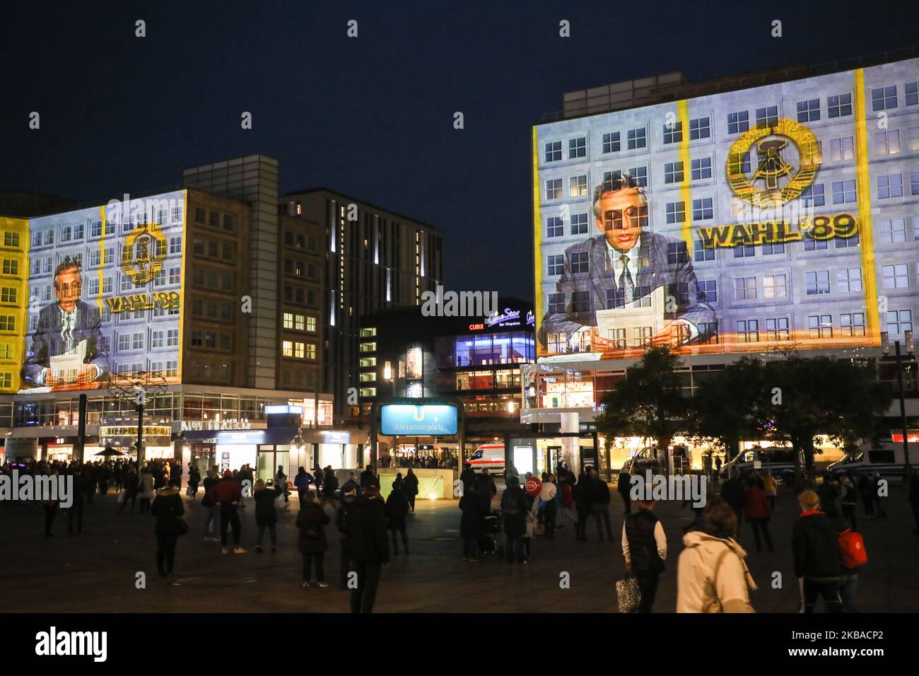 Historic pictures and quotes are projected on the buildings at Alexanderplatz for the upcoming 30th anniversary of the fall of the Berlin Wall. Berlin, Germany on 8 November, 2019. (Photo by Beata Zawrzel/NurPhoto) Stock Photo