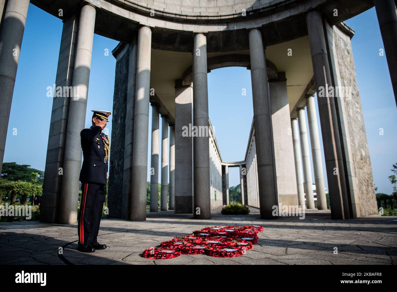 High ranking officials from Philippines stand still and salute during the Remembrance Day commemoration ceremony at Htauk Kyant war cemetery in Yangon, Myanmar on November 10, 2019. Remembrance day is observed by Commonwealth nations and some other countries to mark the contribution of members of the Armed Forces who served in the two World Wars and later conflicts. (Photo by Shwe Paw Mya Tin/NurPhoto) Stock Photo