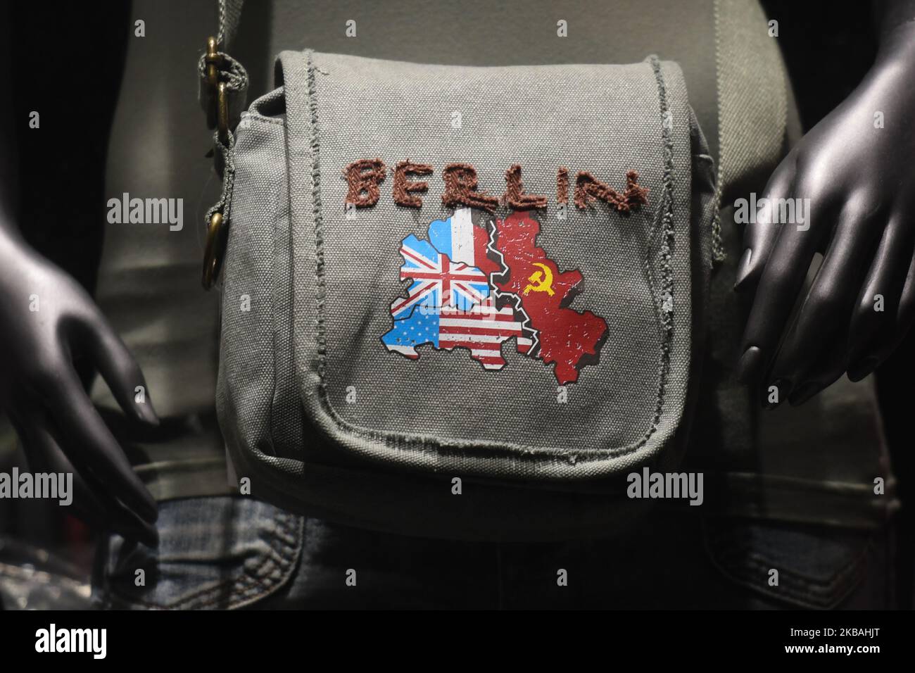 A bag with an image of divided Berlin areas between Allied Forces and the Soviet Union, seen on the day of the official ceremony of the 30th anniversary of the fall of the Berlin Wall, at Berlin Wall Memorial in Bernauer Strasse. On Saturday, November 9, 2019, in Berlin, Germany. (Photo by Artur Widak/NurPhoto) Stock Photo