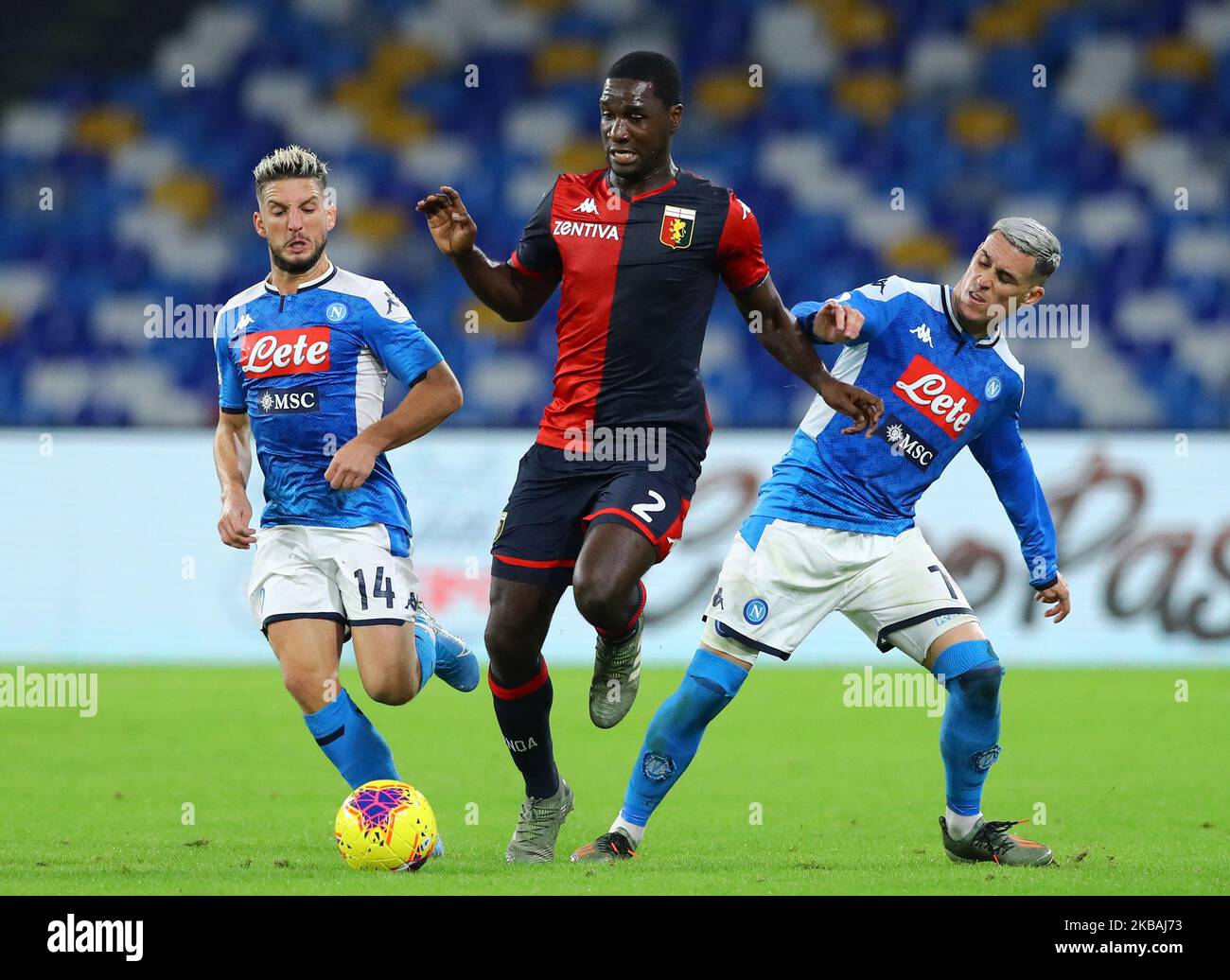 Cristian Zapata of Genoa in action between Dries Mertens and Jose Maria Callejon of Napoli during the Serie A match Napoli v Genoa at the San Paolo Stadium in Naples, Italy on November 9, 2019 (Photo by Matteo Ciambelli/NurPhoto) Stock Photo