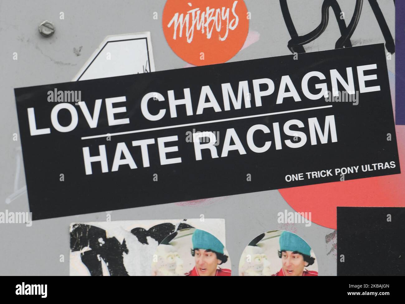 'Love Champagne Hare Racism' sticker seen in Berlin city. On Thursday, November 7, 2019, in Berlin, Germany. (Photo by Artur Widak/NurPhoto) Stock Photo